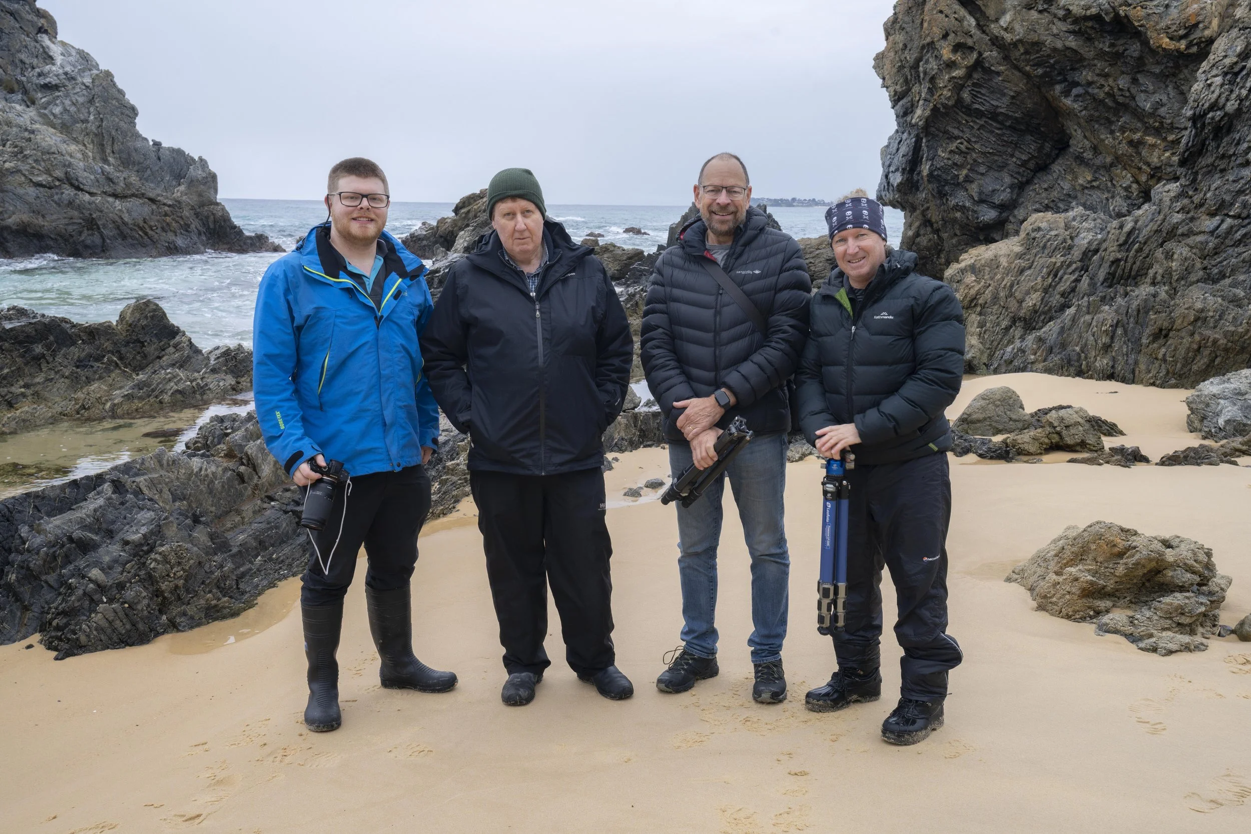 Photography workshop participants posing together after an outdoor session, Bermagui, New South Wales