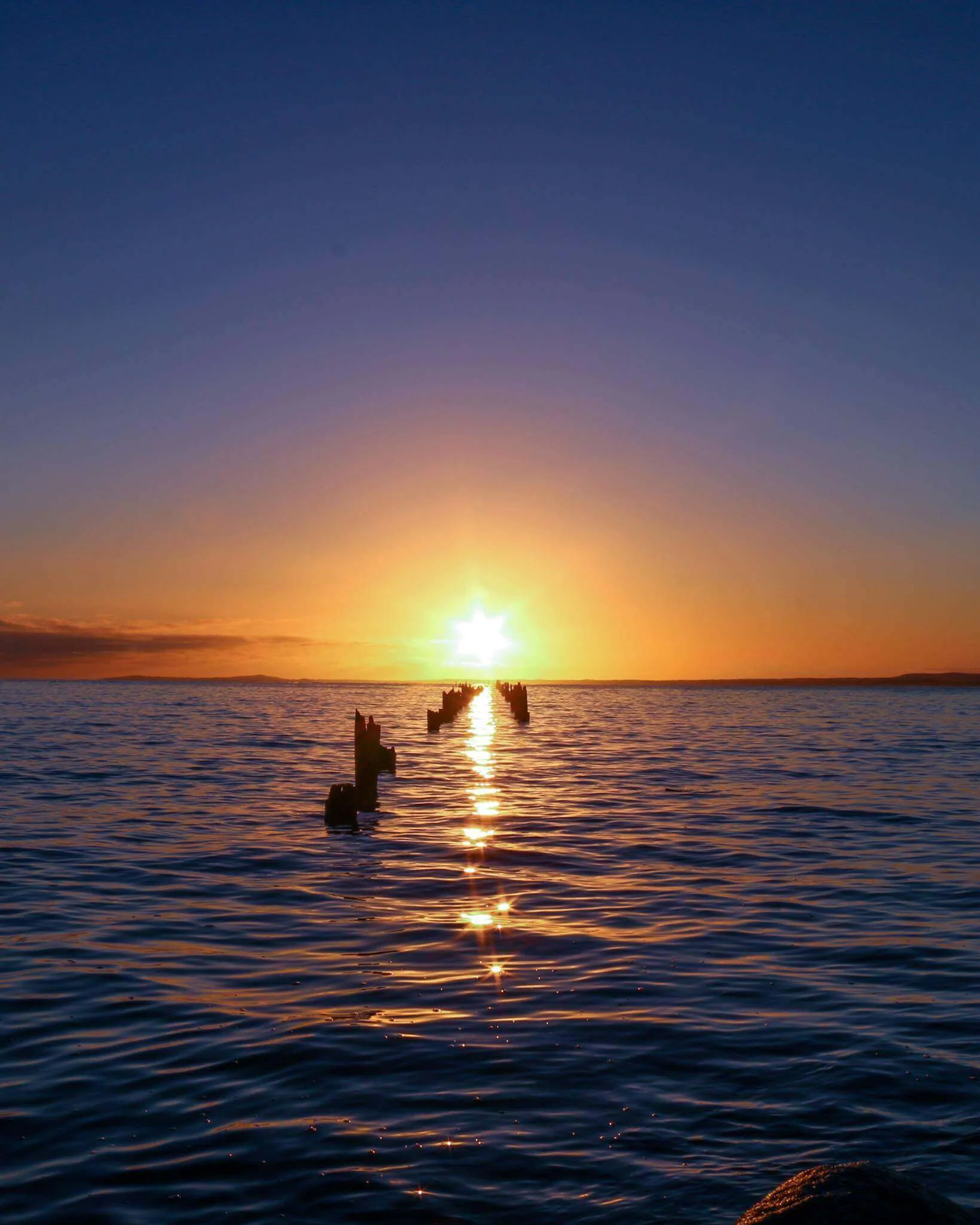 Bridport Old Pier sunlight.jpg
