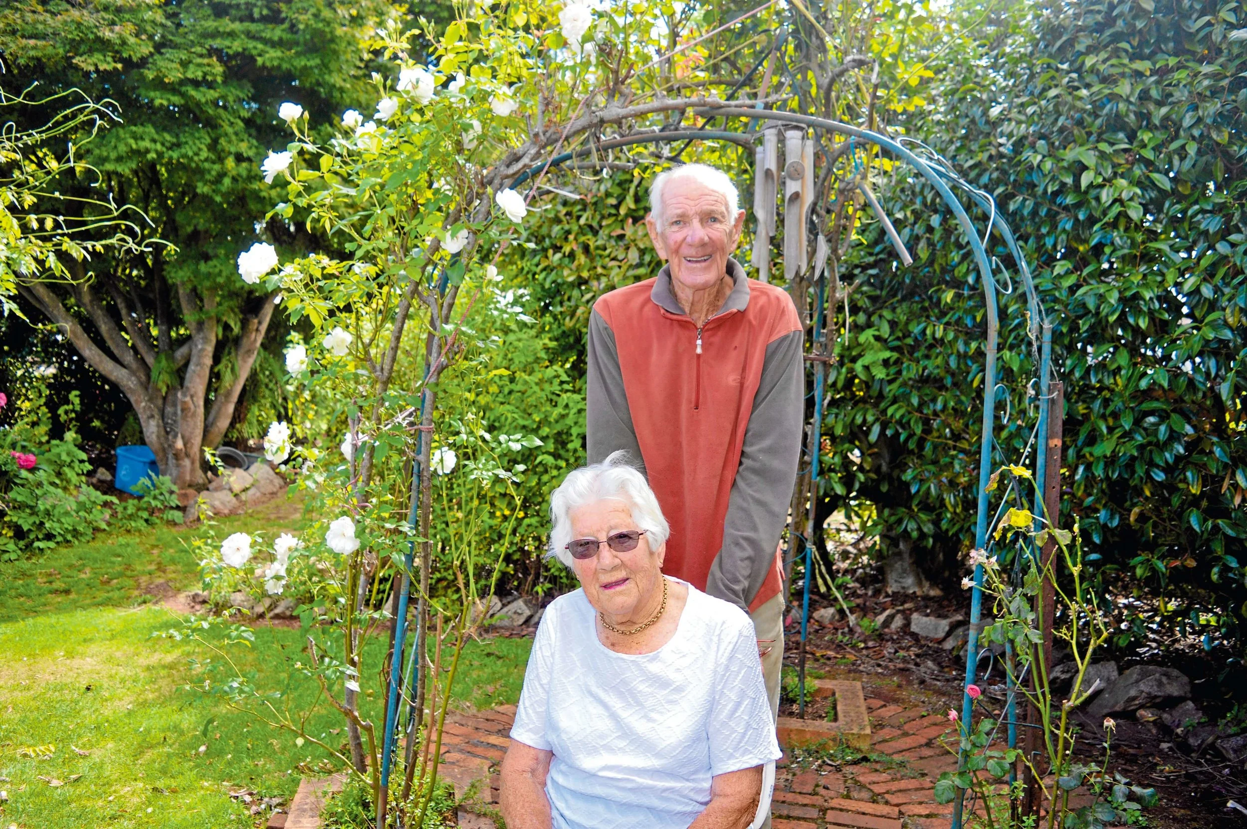 • Glenn and Shirley Gerke in the garden of their Scottsdale home.