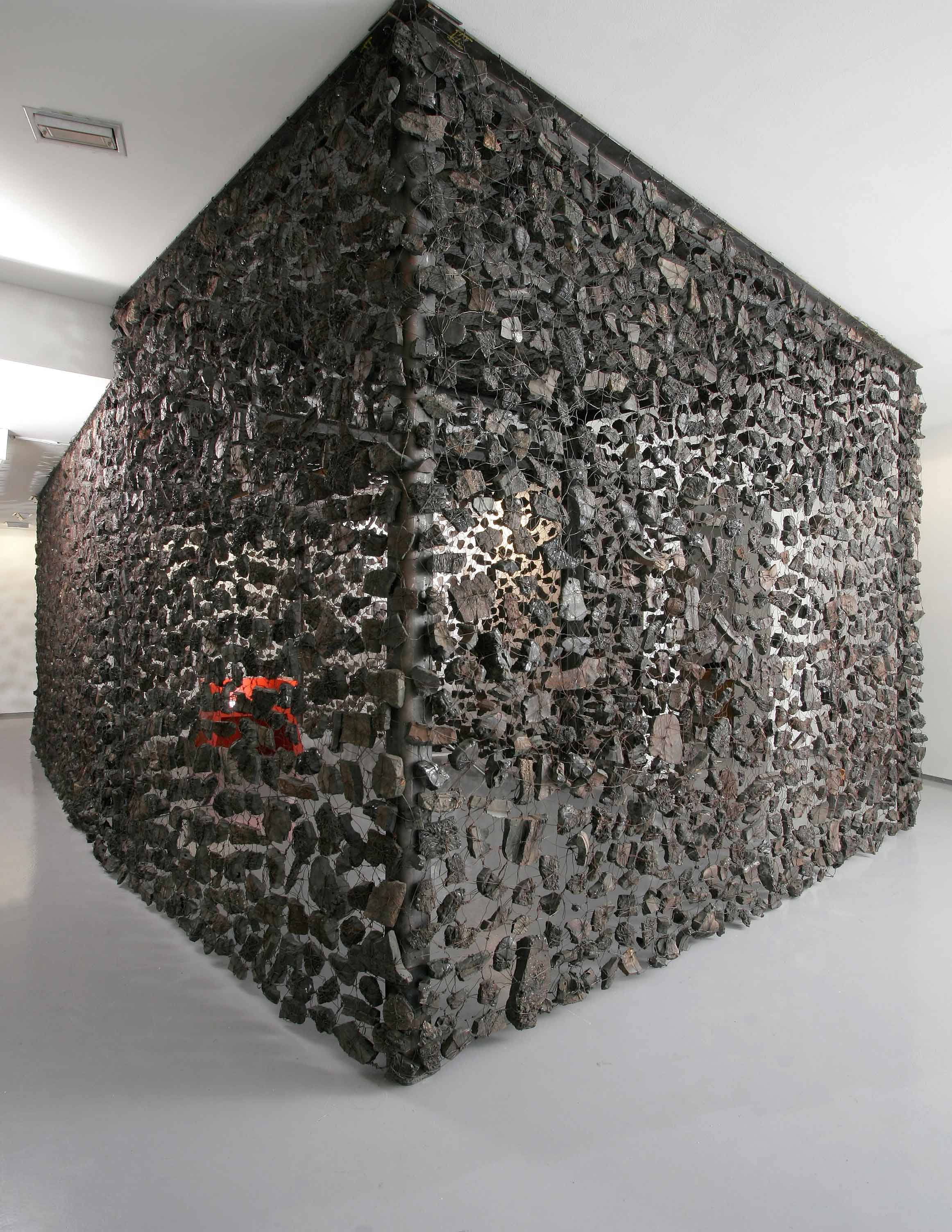 11.-Always-watch-what-the-hands-do,2007,-280-x-600-x-320-cm,-metal-structure,wire,mine-debris,-seat-painted-steel.jpg