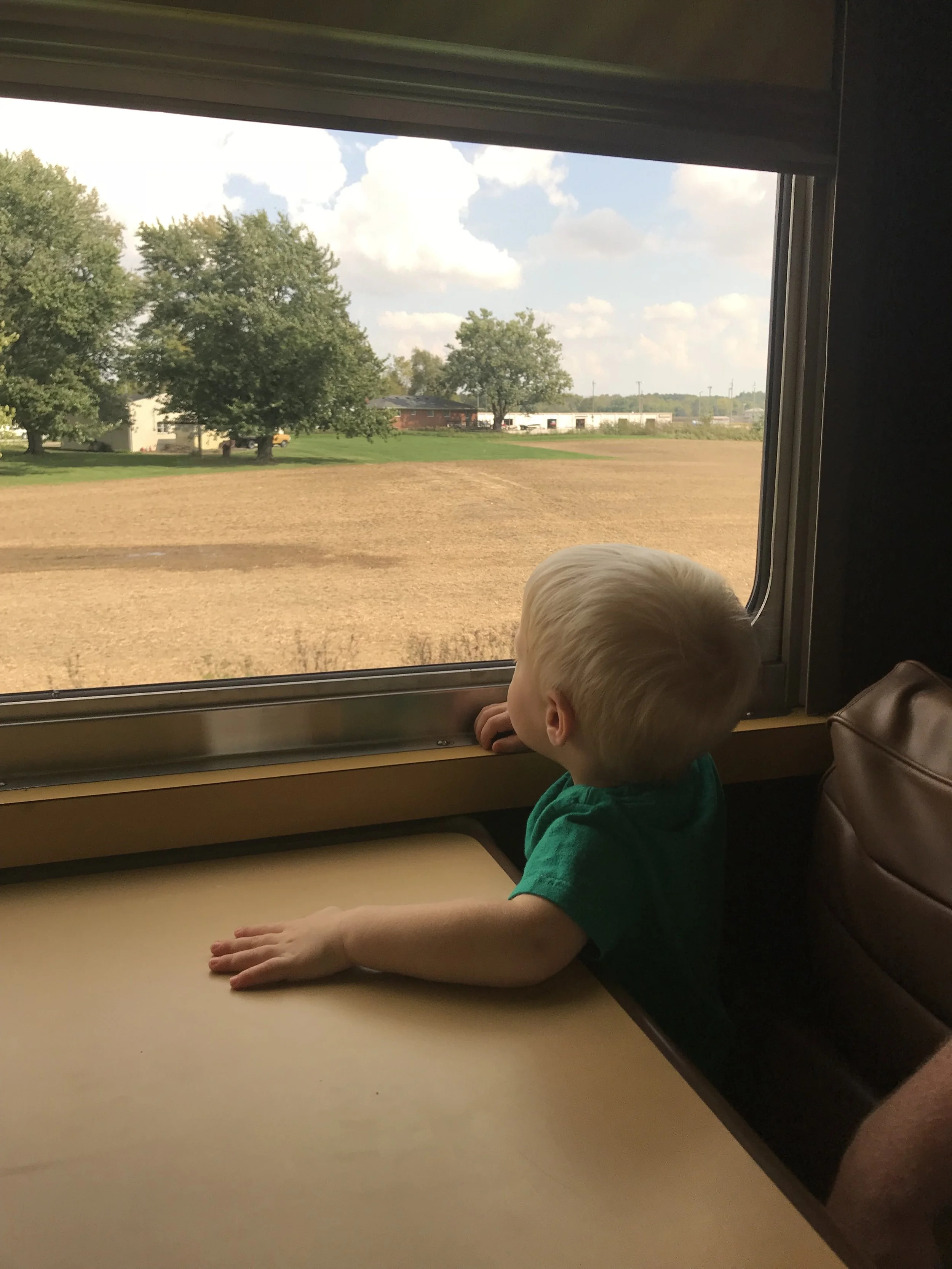 Kid looking out window .jpg