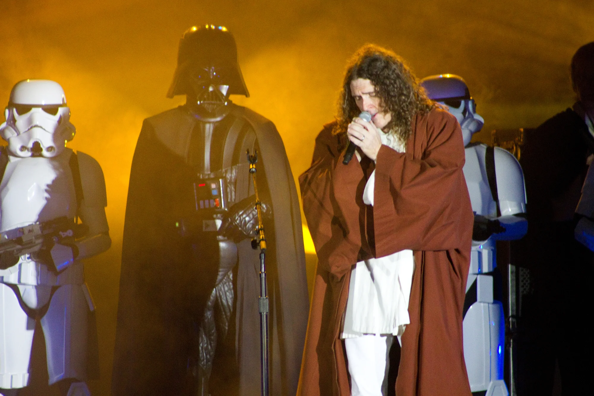 Mark (as Vader) and the 501st rocking out on stage with Weird Al Yankovic.