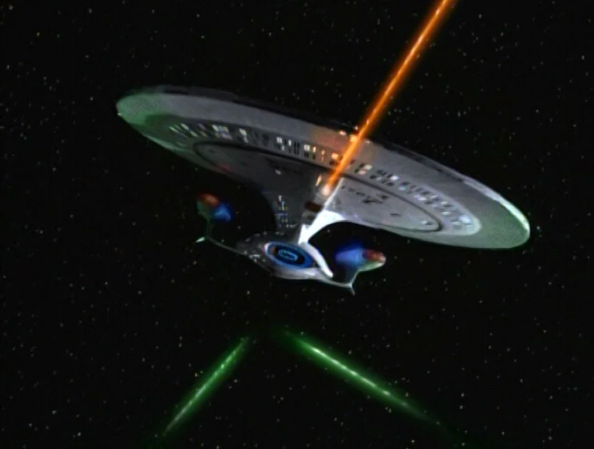 USS_Enterprise-D_2395_firing_phasers.jpg