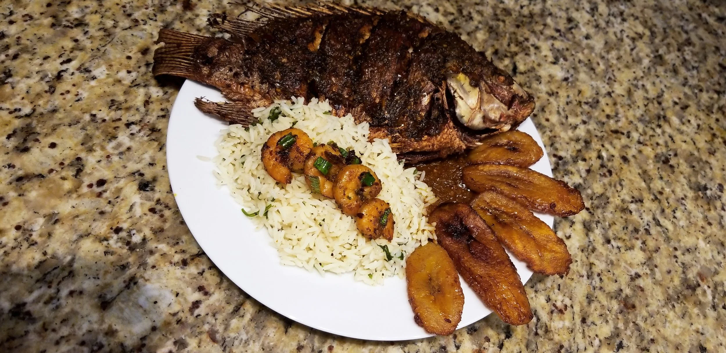 Whole Grilled Tilapia, Grilled Shimp, Fried Plantains, & Cilantro Rice