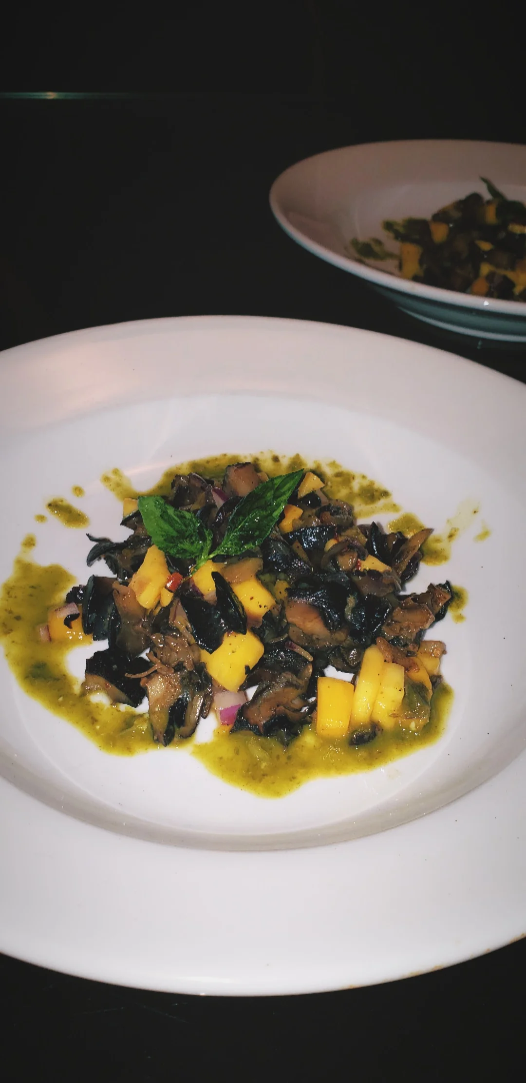 Igbin. peppered snails with Cameroon mangoes & basil oil