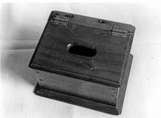 This offering box was used in Deep Run's second building with the date 1766 inscribed on the top of the lid and 1872 underneath. Credit: Jay Ruth