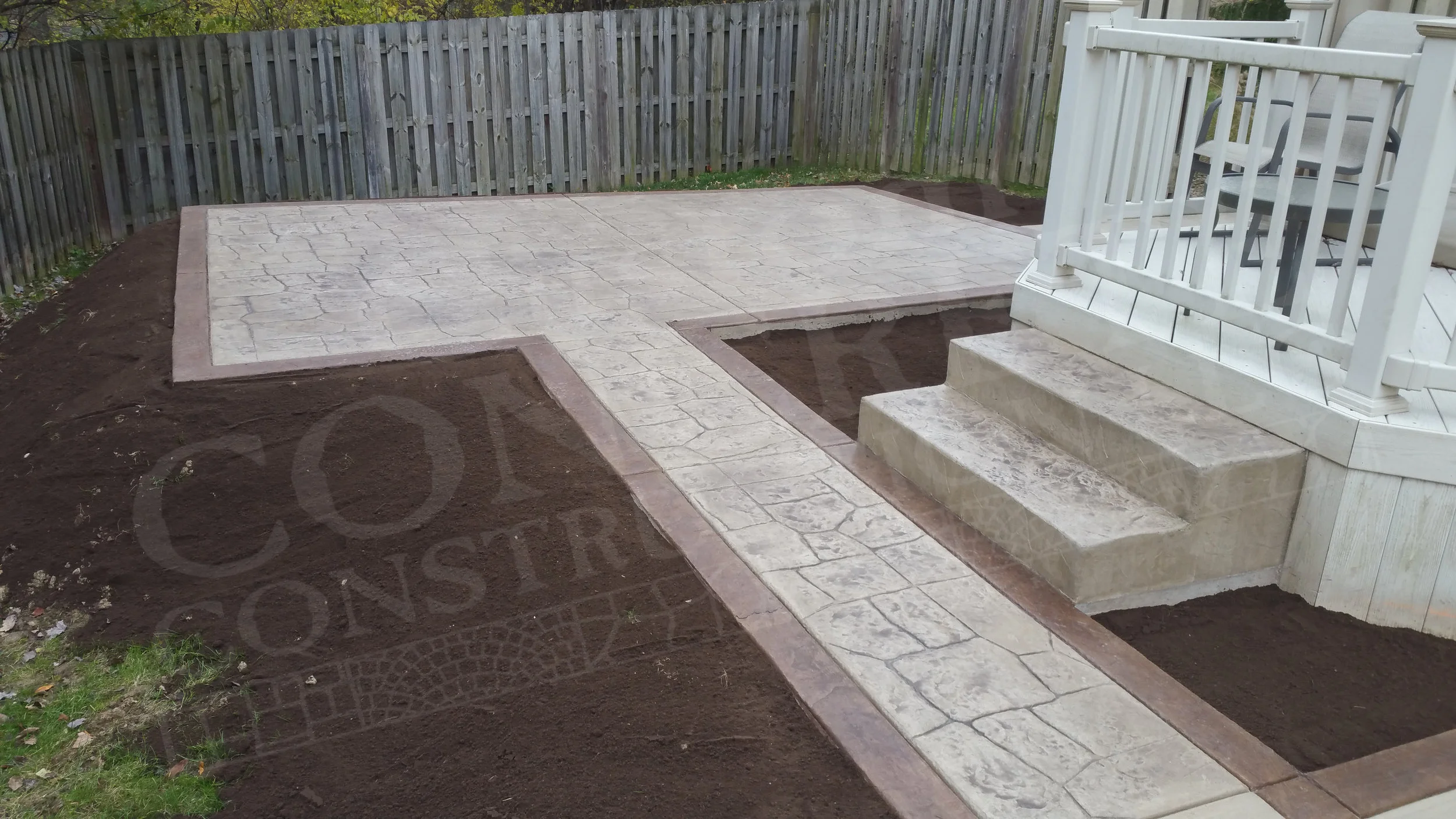 Stamped Patio, Sidewalk, and Steps completed at a Canfield home