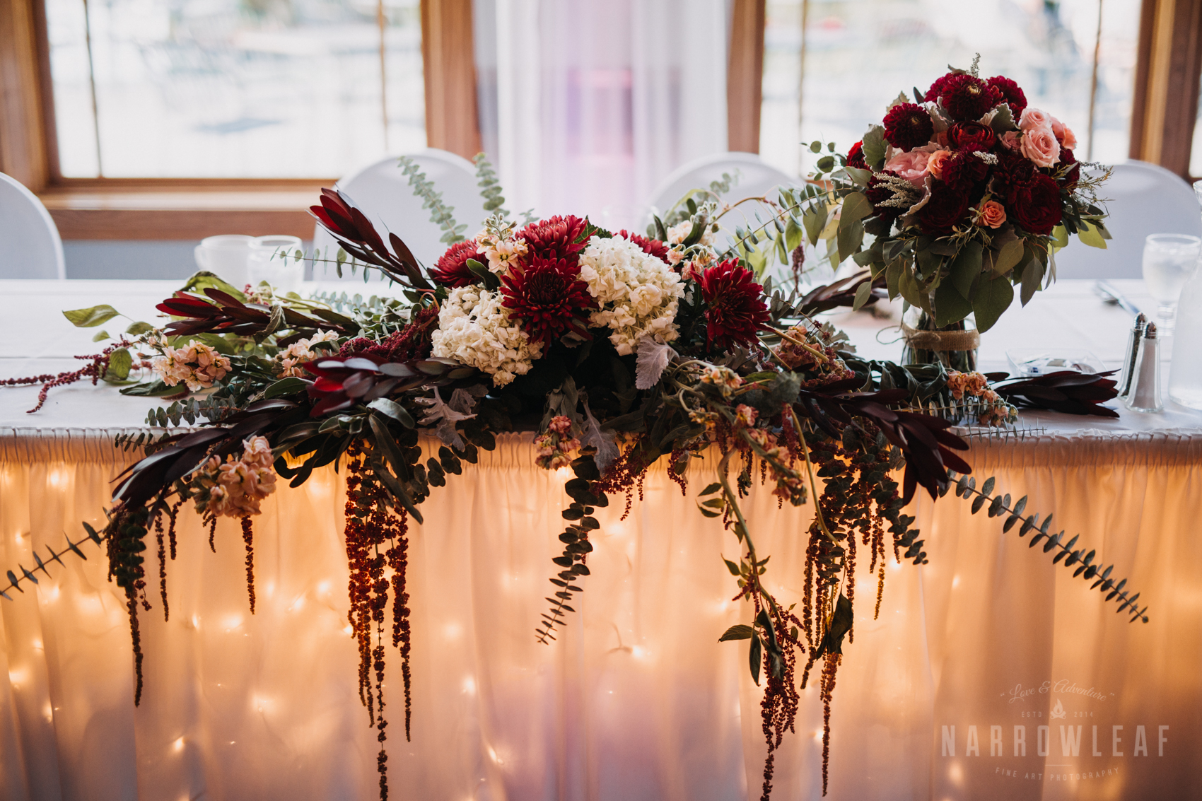 reception-head-table-red-floral-florian-gardens-summer-wedding-wisconsin-130.jpg