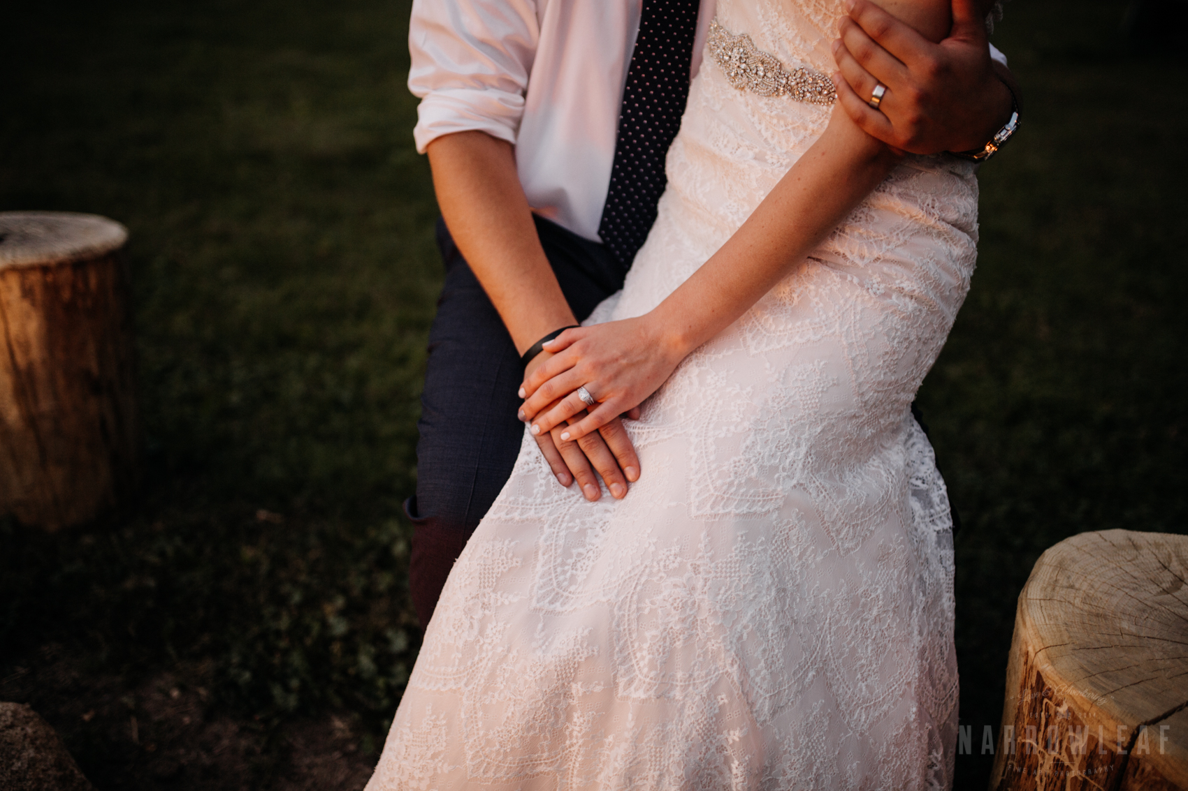 bride-groom-cuddling-by-the-bonfire-under-cafe-lights-night-34.jpg