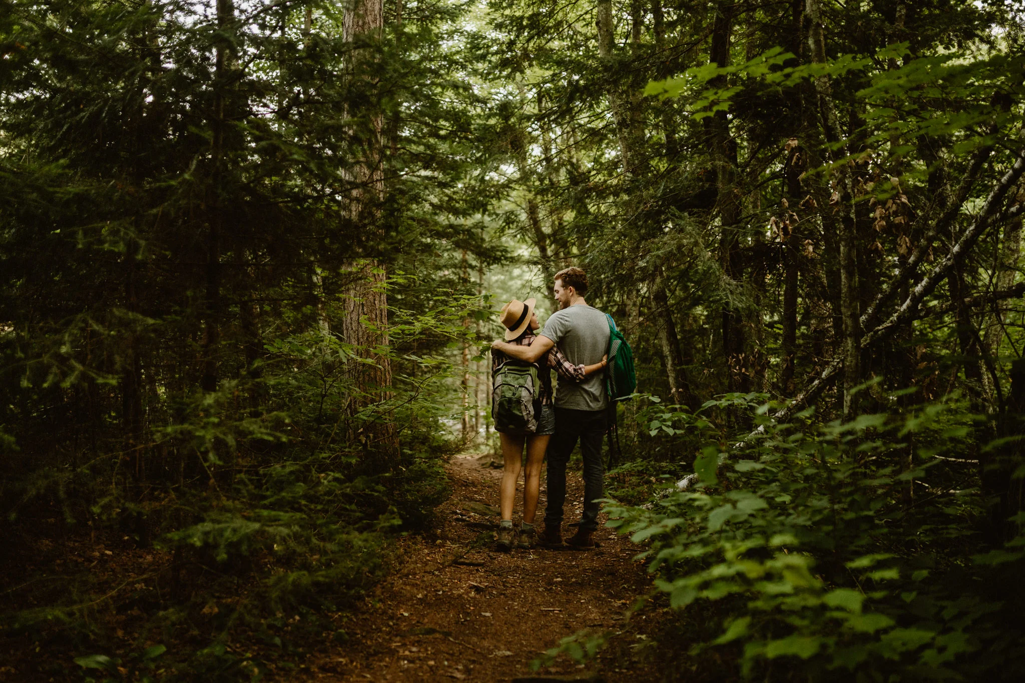 Minnesota engagement photography | couple hiking through the north woods at Banning State Park