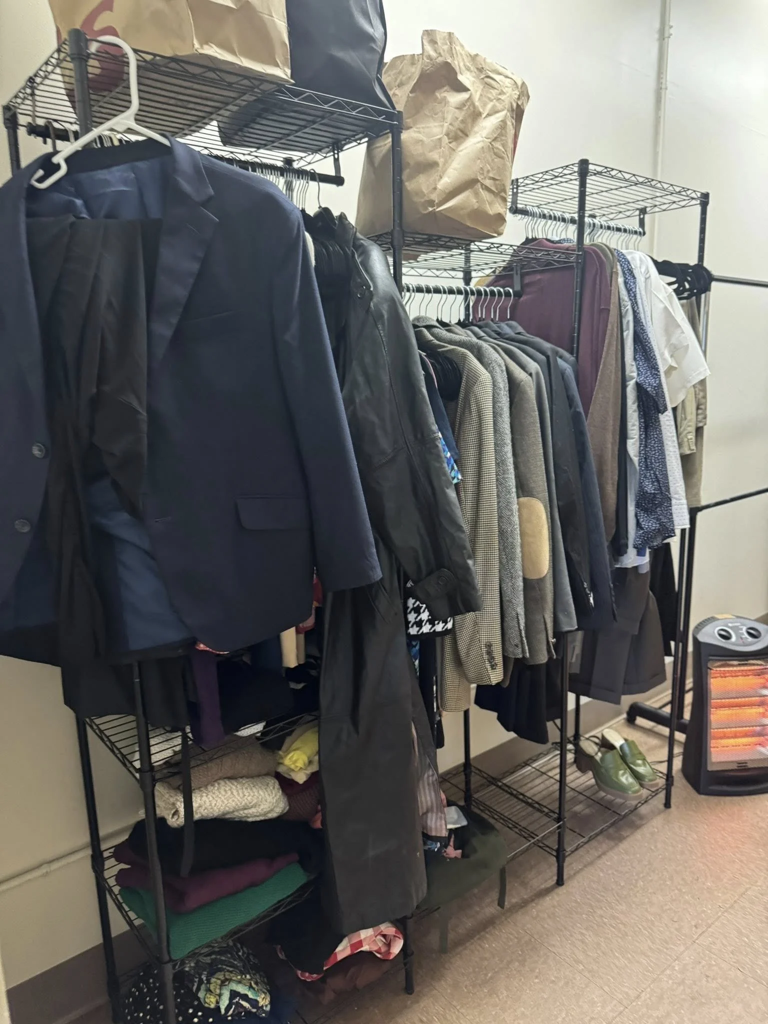 Clothing rack full office-appropriate blazers and tops