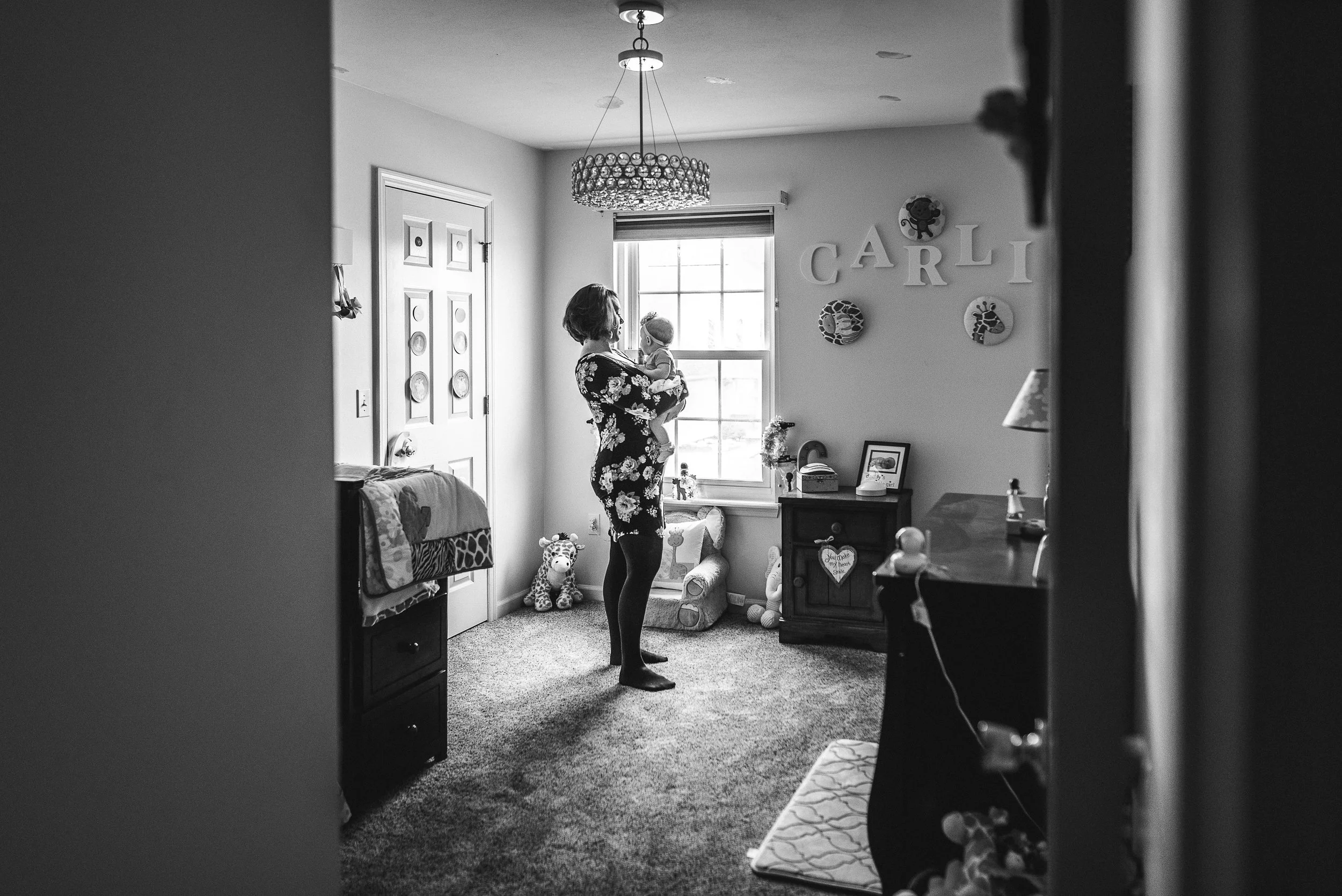 mom in nursery with 7 month old