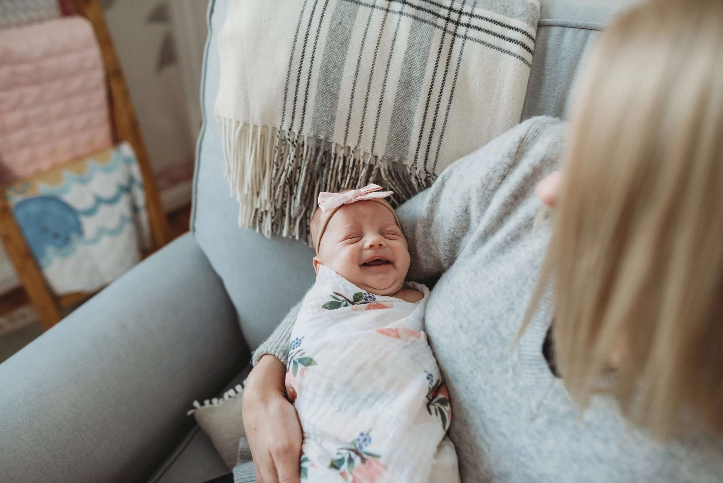 mom holding baby