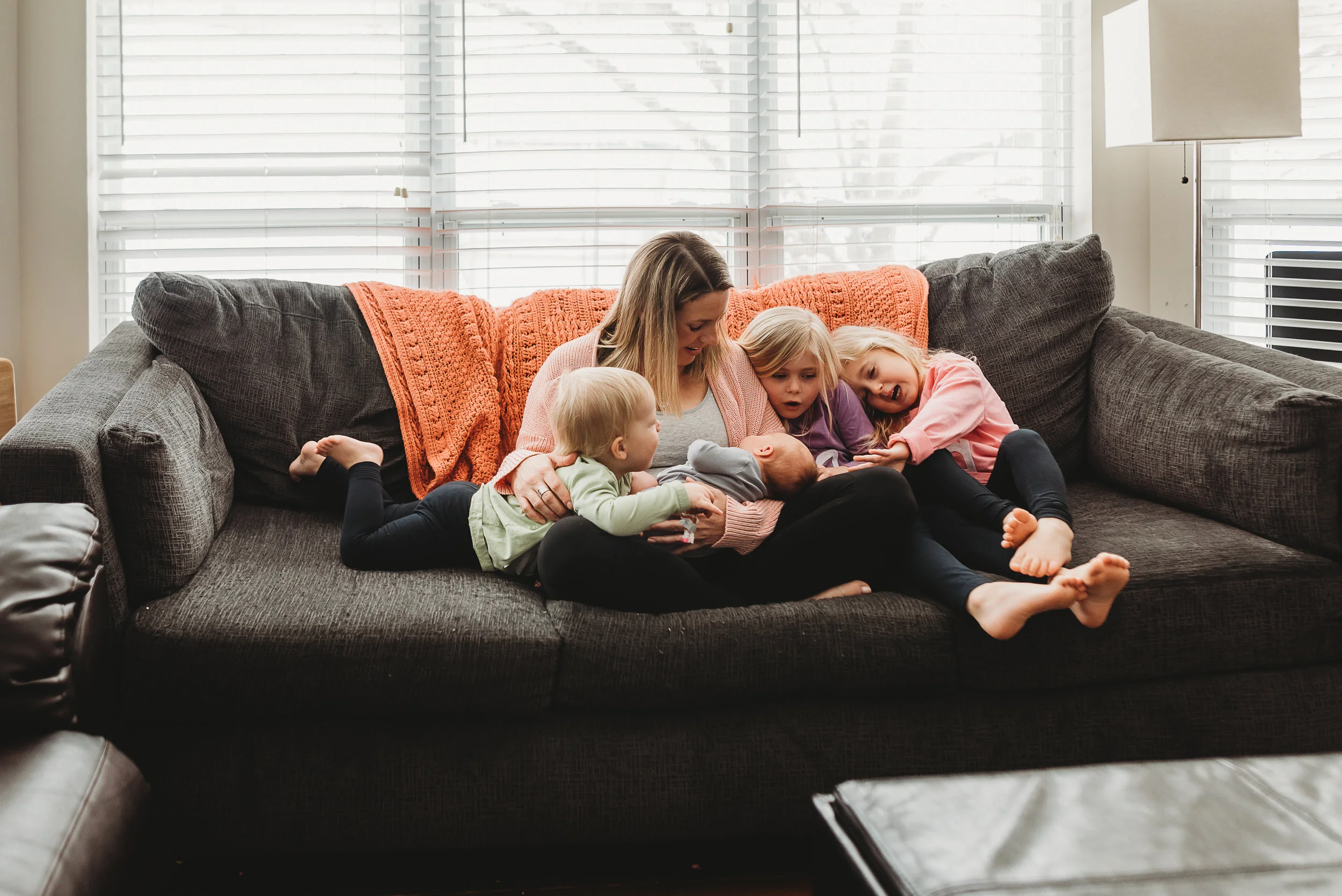 mom with girls on the couch