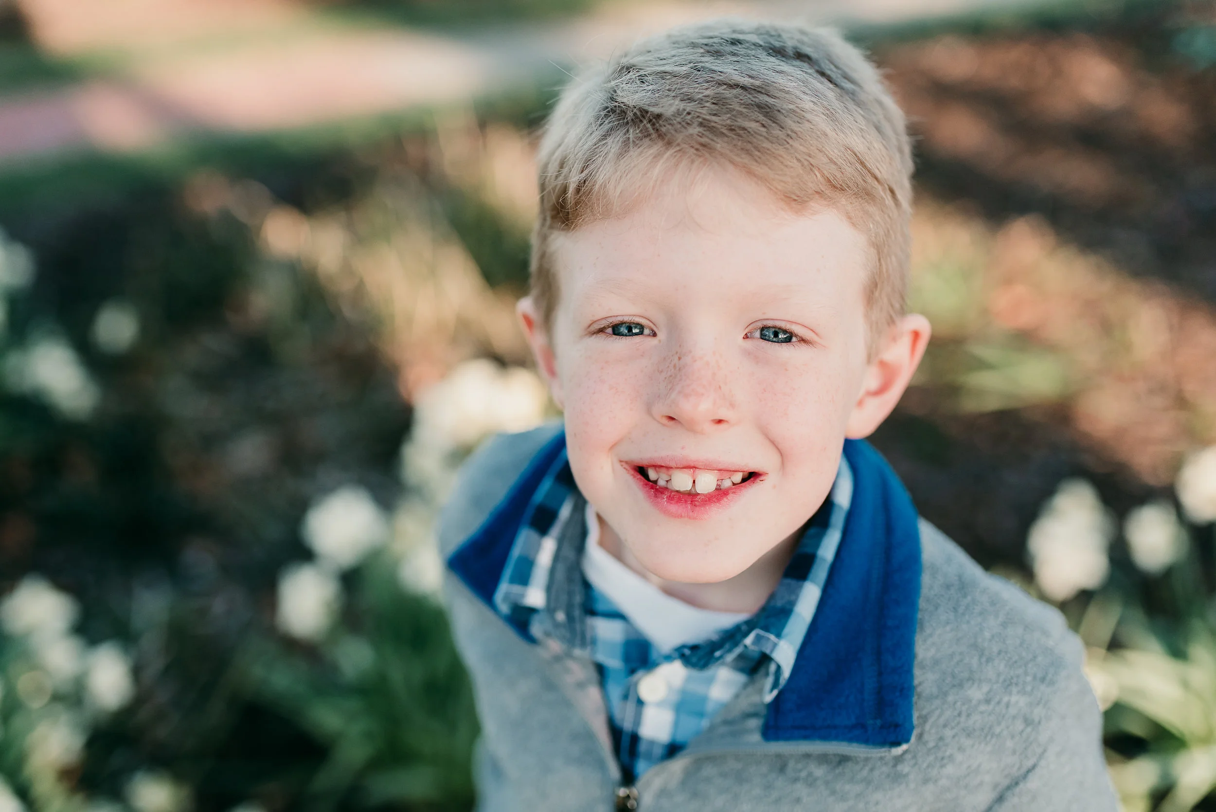 young boy smiling| St. Louis Family photographer
