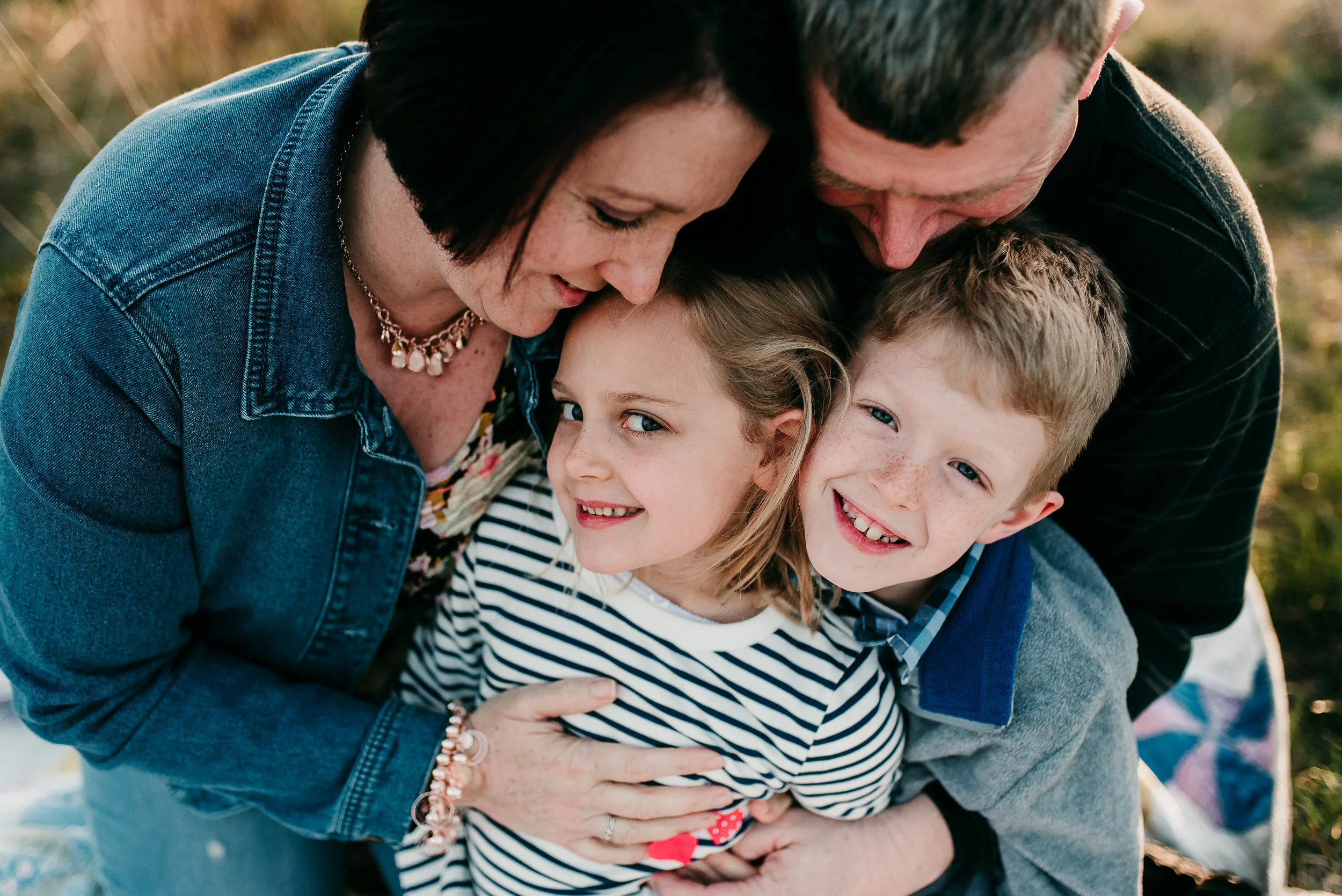 family hugging each other | St. Louis outdoor photography