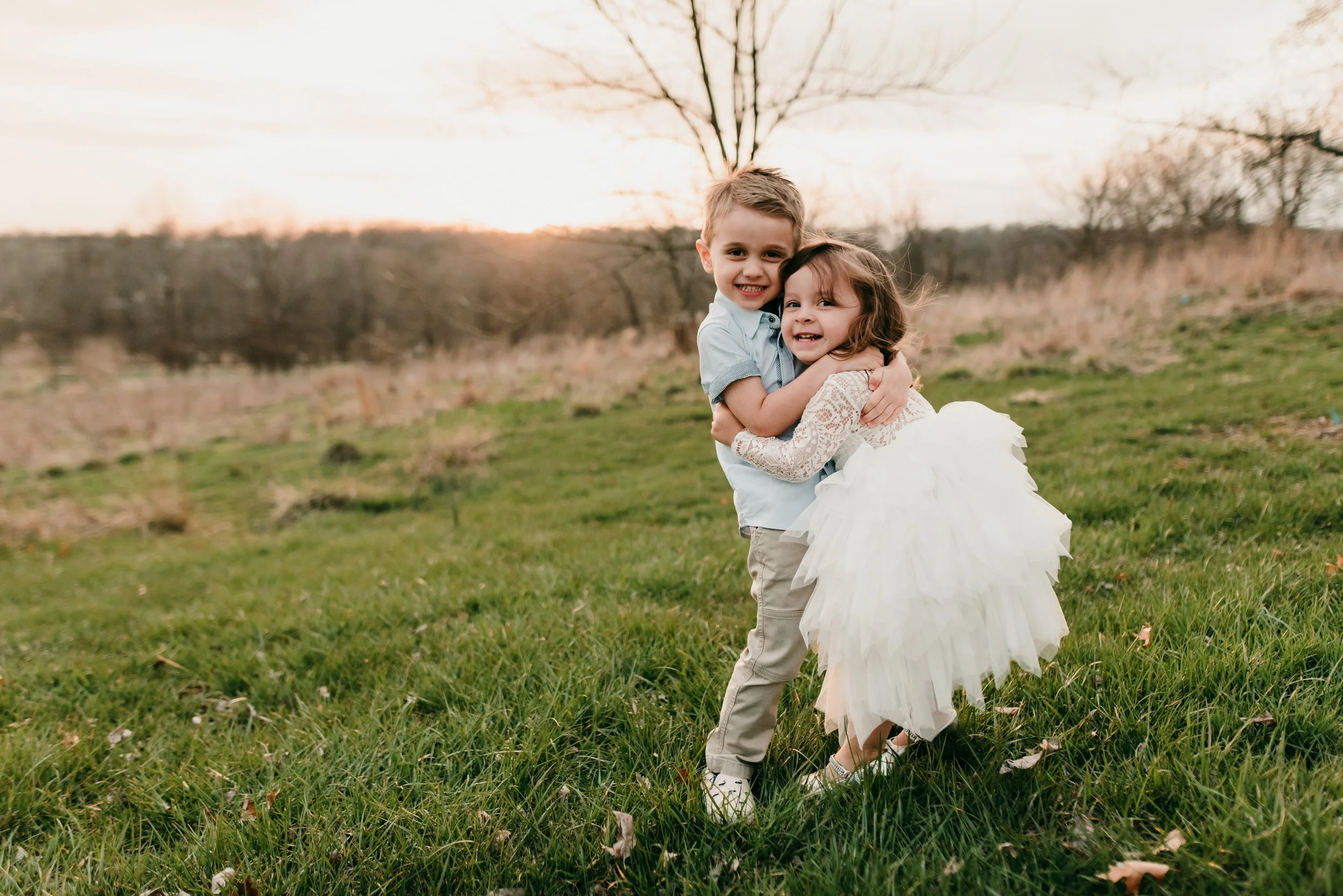 siblings hugging