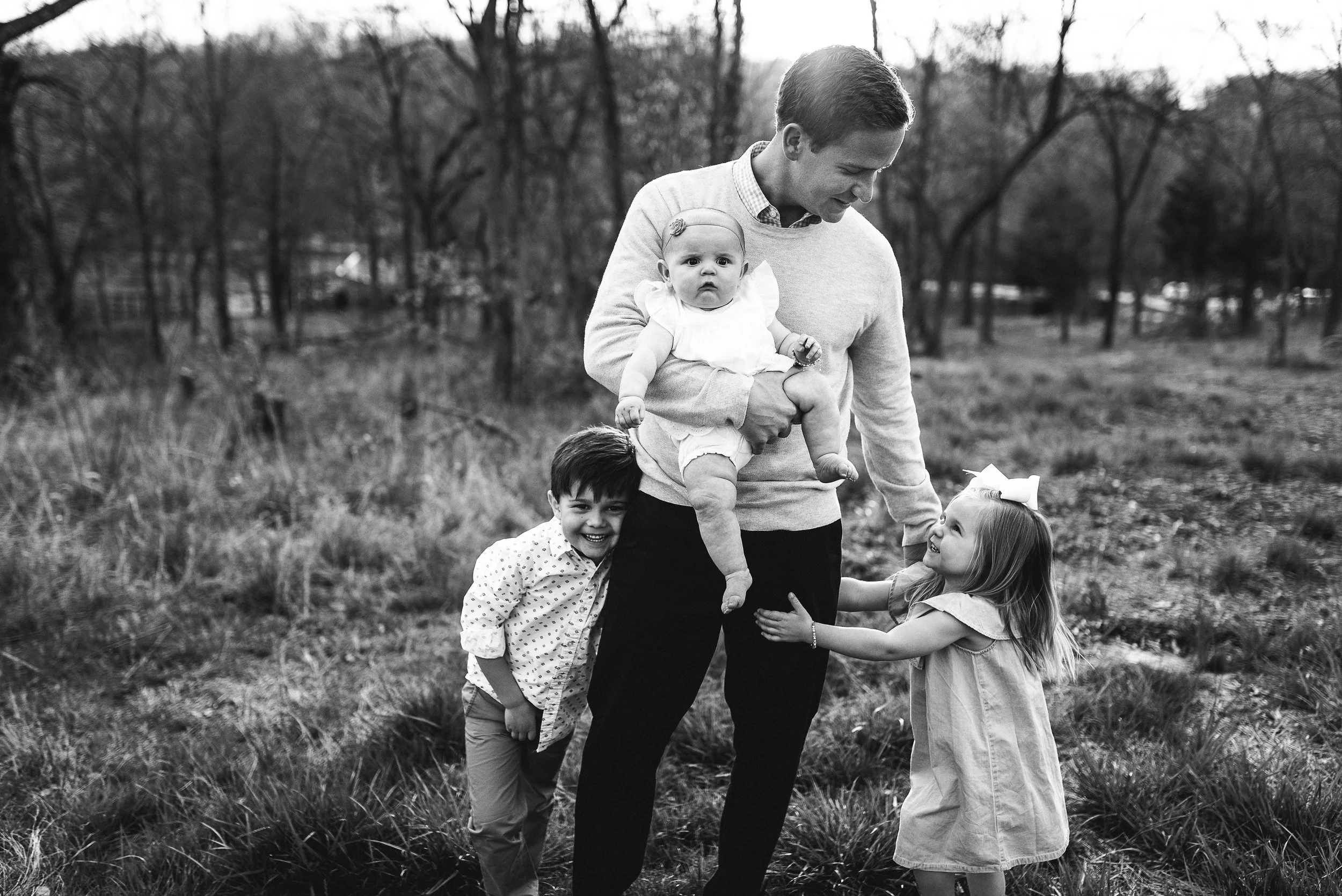 dad with 3 young children