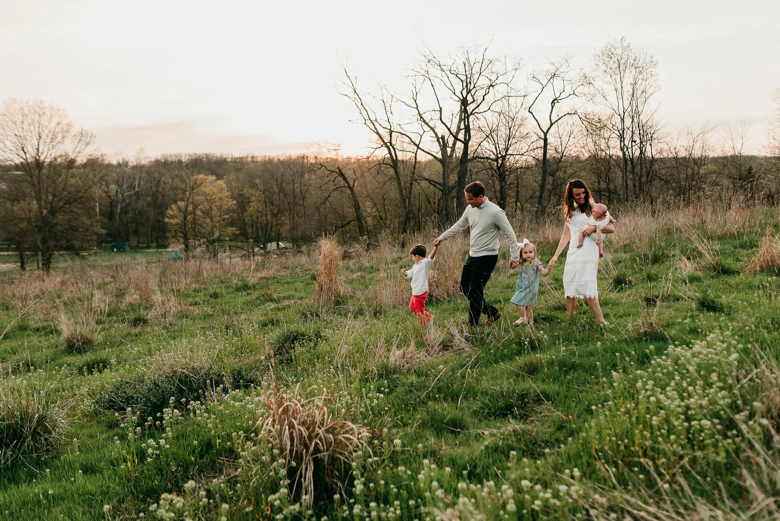 family walking in field