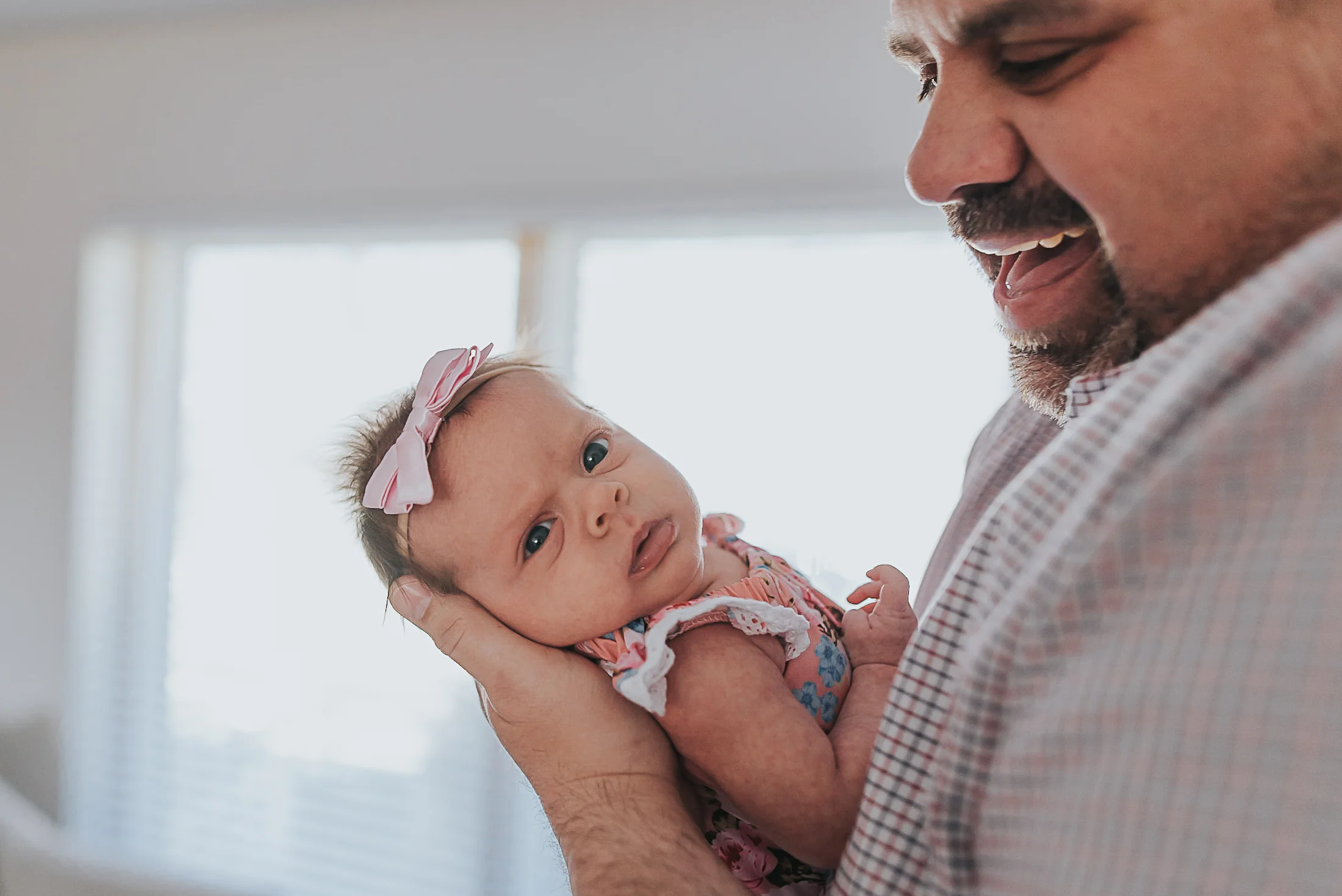 baby looking at camera St. Louis newborn photographer
