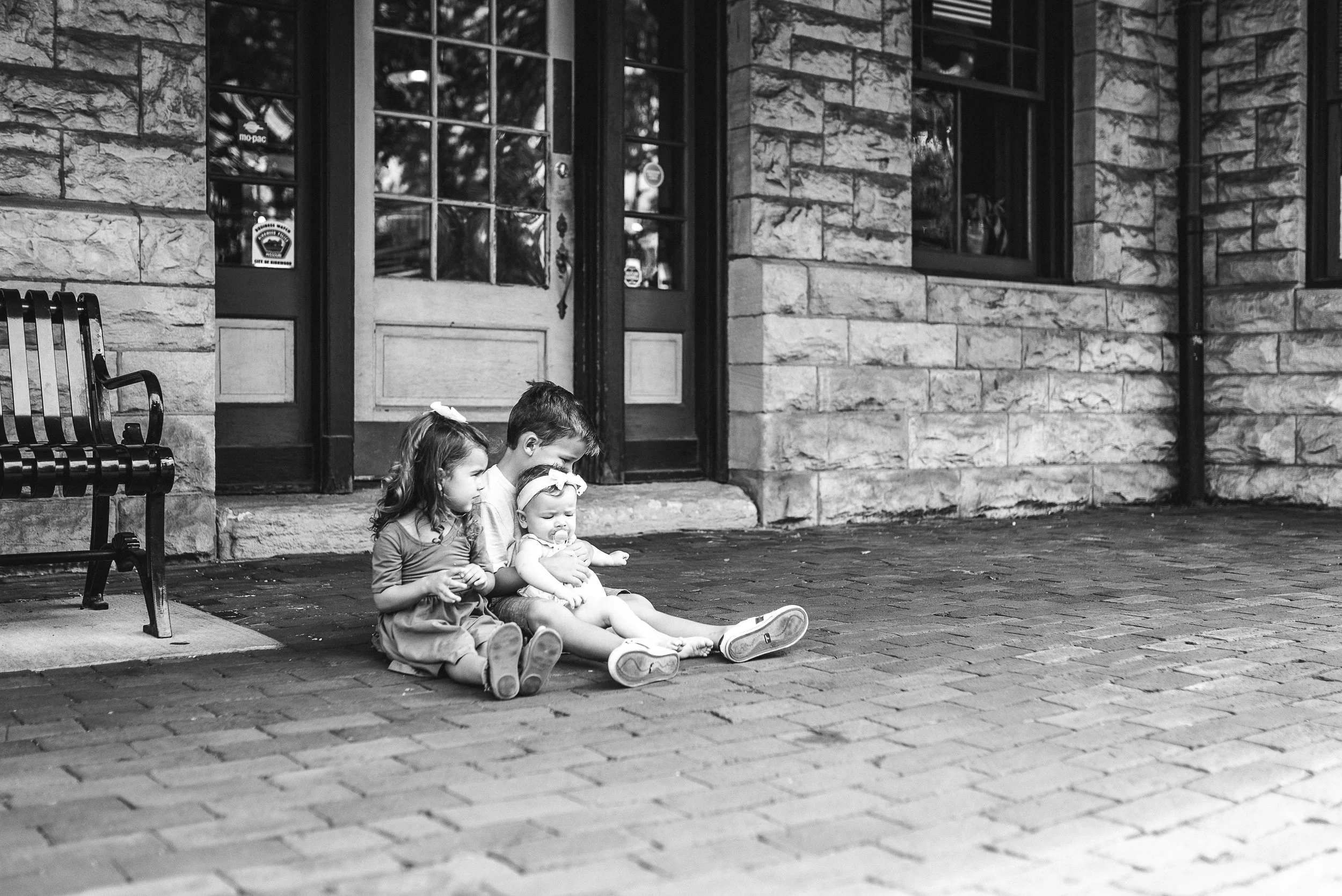 siblings at train station
