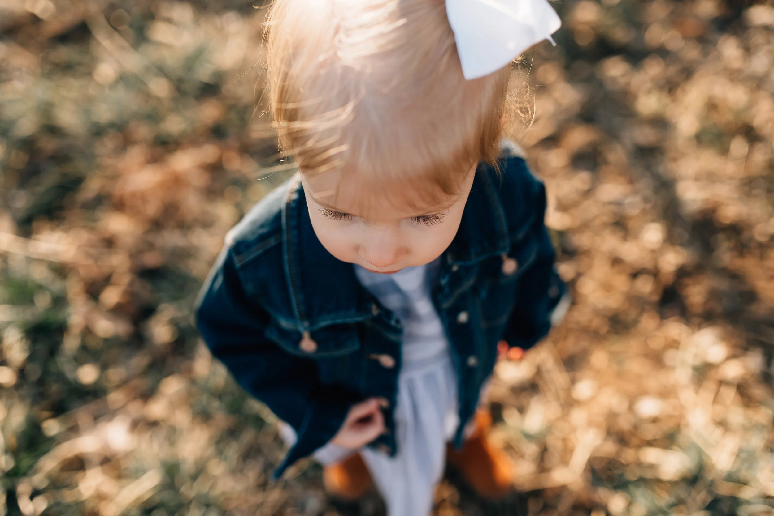 looking down at little girl