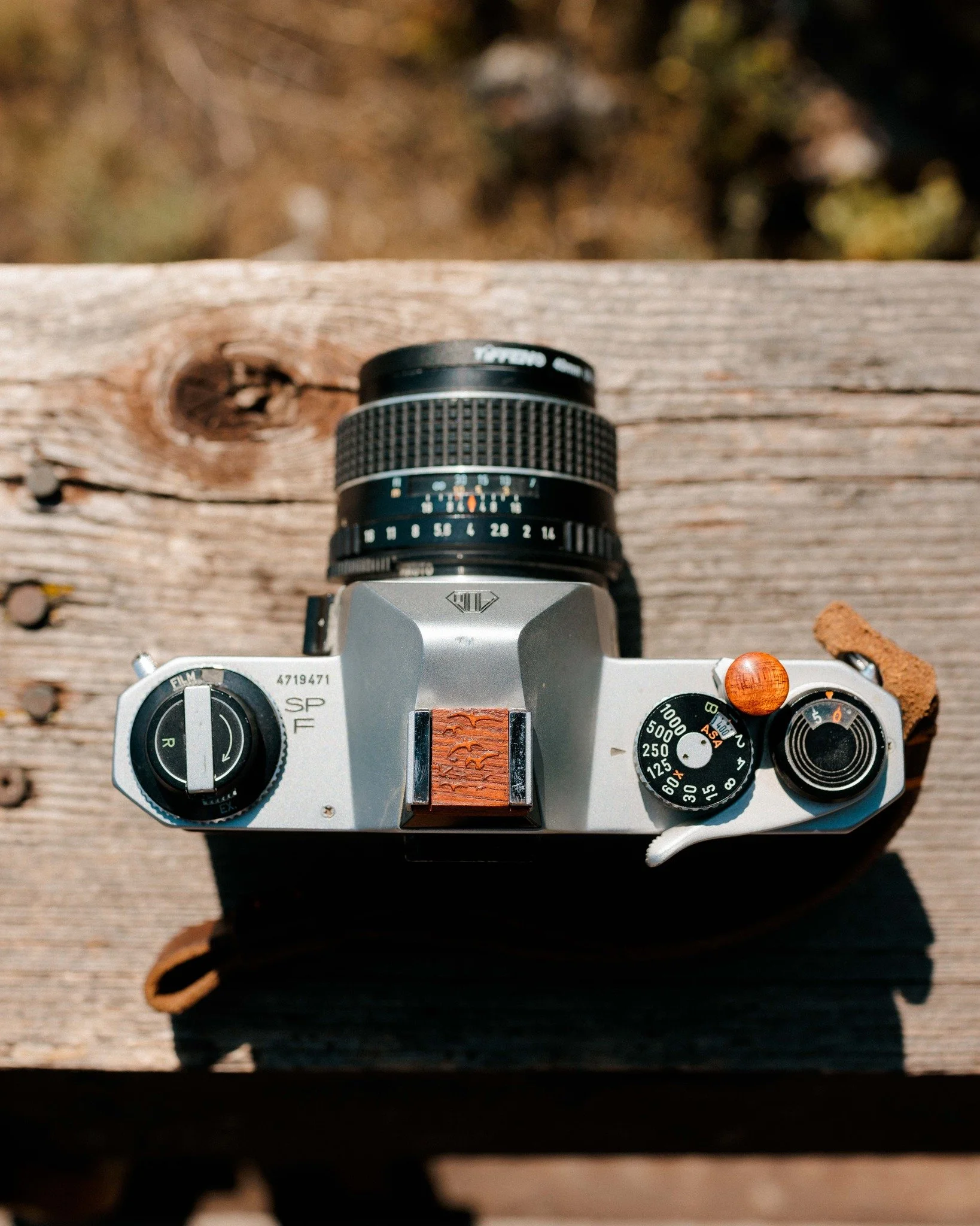 &quot;Be daring, be different, be impractical, be anything that will assert integrity of purpose and imaginative vision against the play-it-safers.&quot; &mdash; Cecil Beaton

Every detail counts. This Pentax Spotmatic F is outfitted with a bloodwood