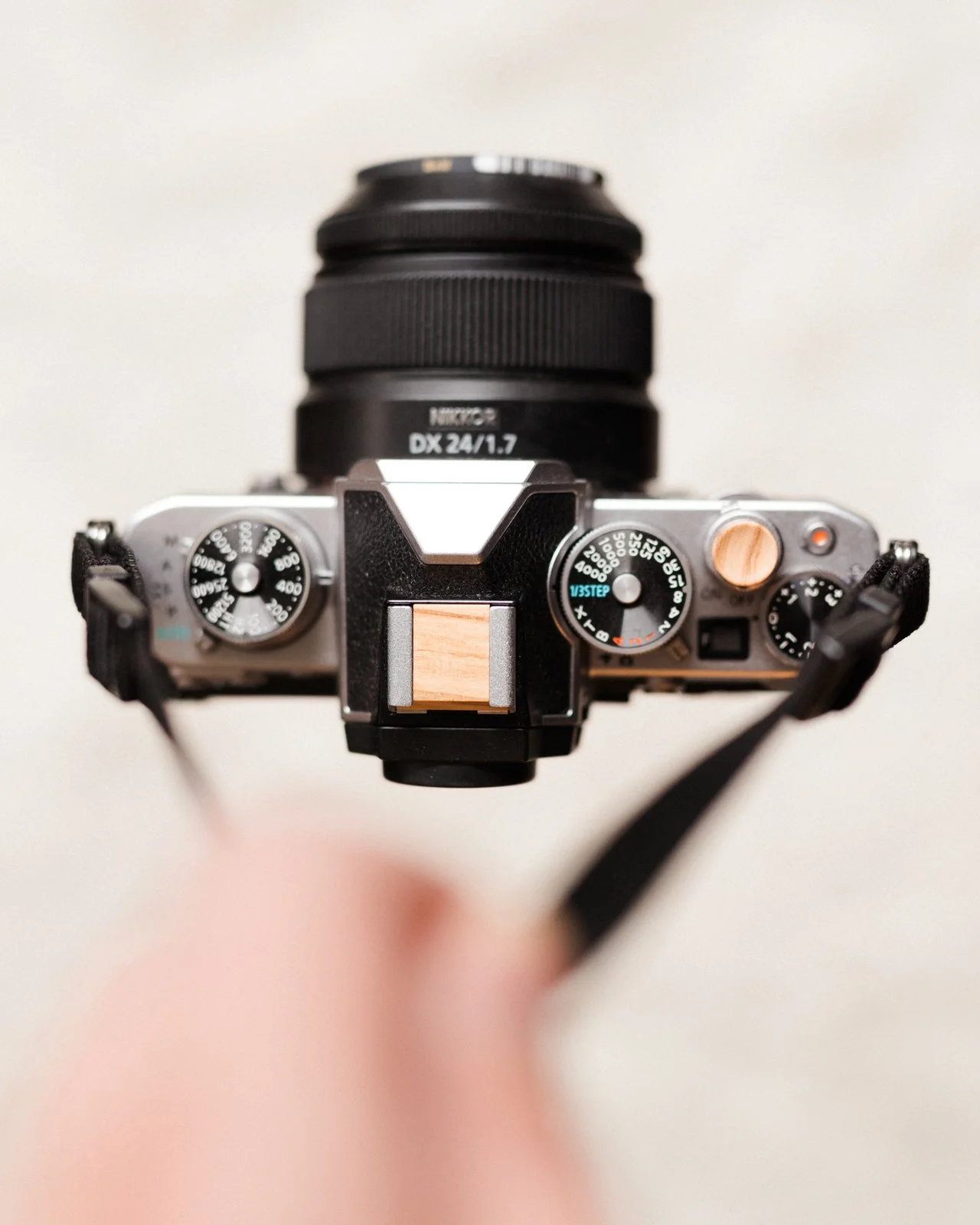 &ldquo;Beauty is the harvest of presence.&rdquo; - Cedric Wright

This Nikon Zfc, outfitted in Wild Olive wood, is more than stylish &mdash; it&rsquo;s a call to slow down and see more clearly.

The soft release button and hot shoe cover are handcraf