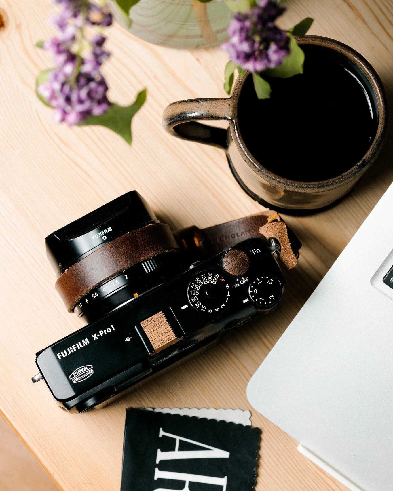 &ldquo;The camera is an instrument that teaches people how to see without a camera.&rdquo; - Dorothea Lange

Outfitted in laser-engraved walnut, this Fuji X-Pro1 carries both message and meaning.

I make each piece not for decoration, but to slow the