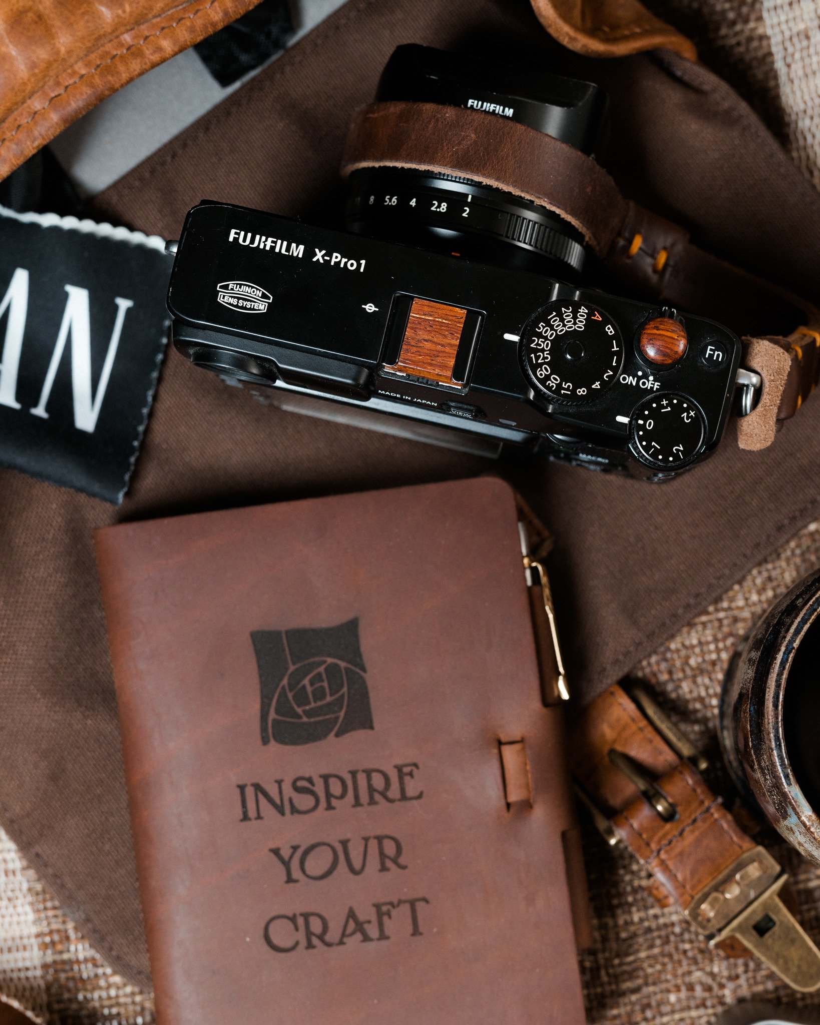 &ldquo;A photograph is usually looked at&mdash;seldom looked into.&rdquo; &mdash; Ansel Adams

Cameras ask for time. Give it freely, and they give something back in return.

Fuji Xpro1 with our Cocobolo hot shoe cover and soft release&mdash;made with