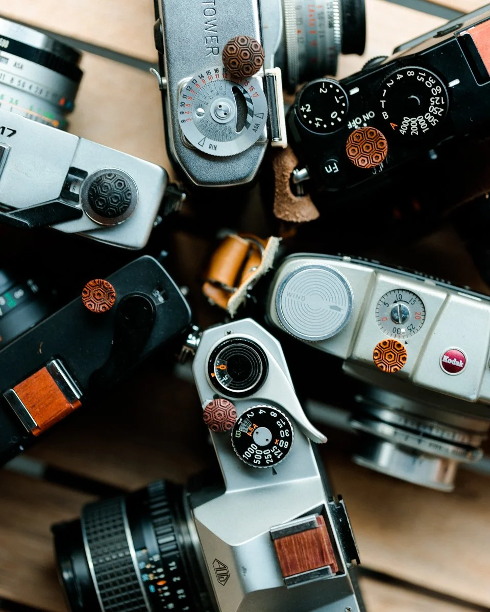 &ldquo;The single most important component of a camera is the twelve inches behind it.&rdquo; &mdash; Ansel Adams

Every camera in this frame is different. Different histories. Different mechanics. Different paths that led them here. Yet they all poi