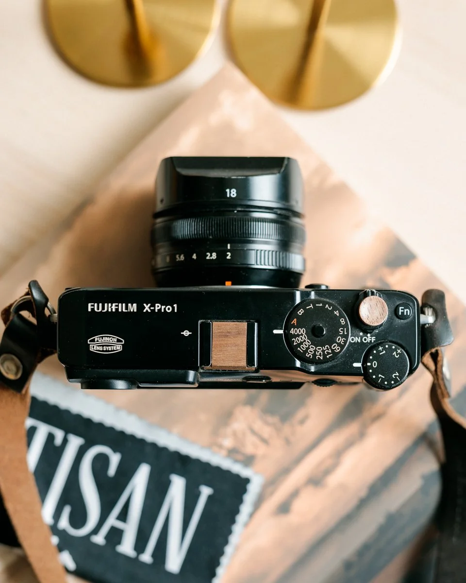 &ldquo;It is more important to click with people than to click the shutter.&rdquo; &mdash; Alfred Eisenstaedt

This X-Pro1, outfitted with a walnut soft release button and matching hot shoe cover, is a reminder that photography starts long before the