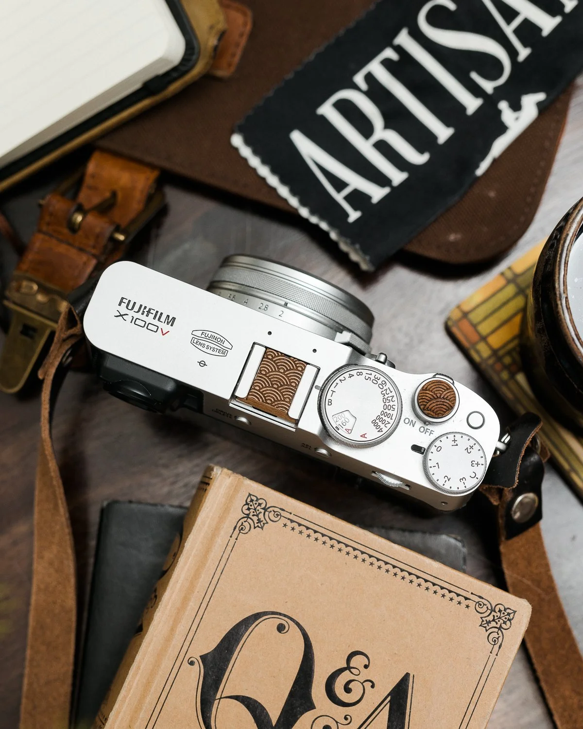 "A good photograph is one that communicates a fact, touches the heart, and leaves the viewer a changed person for having seen it." &ndash; Irving Penn

This Fujifilm X100V, outfitted with a walnut empty rainbows set, brings a sense of rhyth