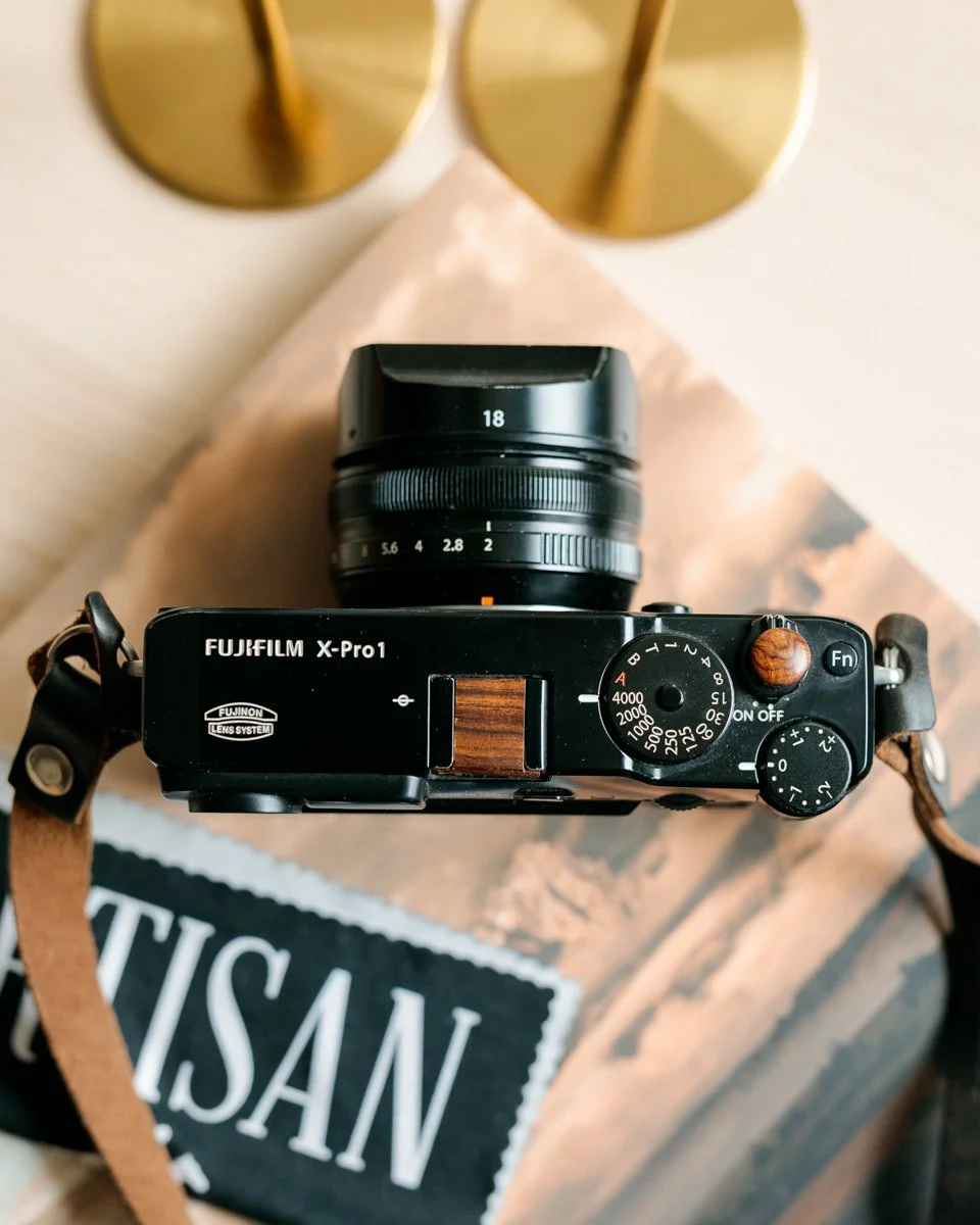 &ldquo;What makes photography a strange invention is that its primary raw materials are light and time.&rdquo; &mdash; John Berger

Every photograph is built from passing things.

This Fuji X-Pro1, outfitted with a Bocote hotshoe cover and a matching