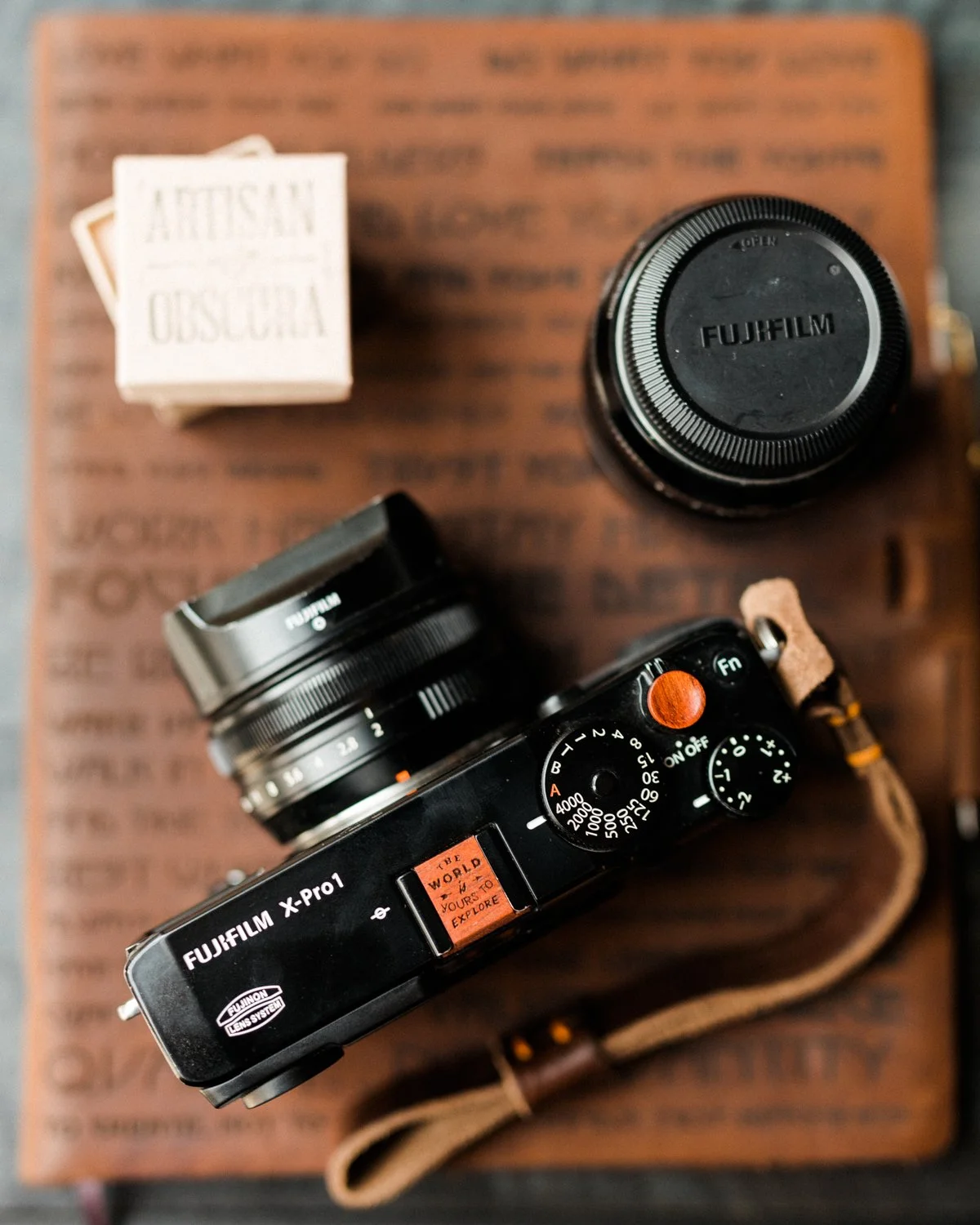 "The eye should learn to listen before it looks." &mdash; Robert Frank

Photographs are rarely made by rushing.

This Fuji X-Pro1, fitted with a The World Is Yours to Explore&ndash;engraved Bloodwood hot shoe cover and matching Bloodwood so