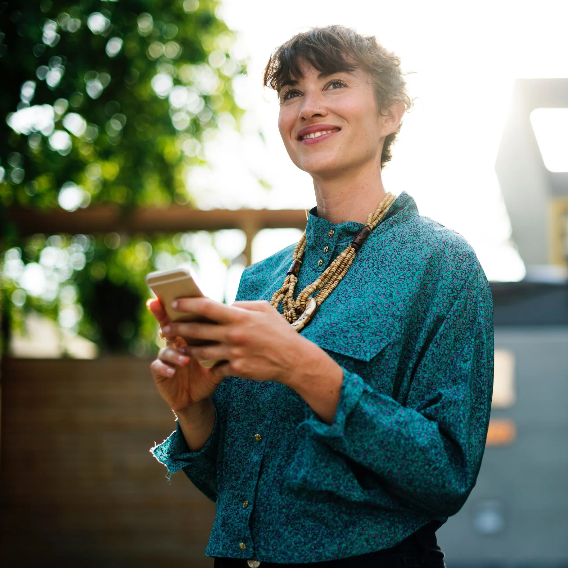 Woman with phone - rawpixel-com.jpg