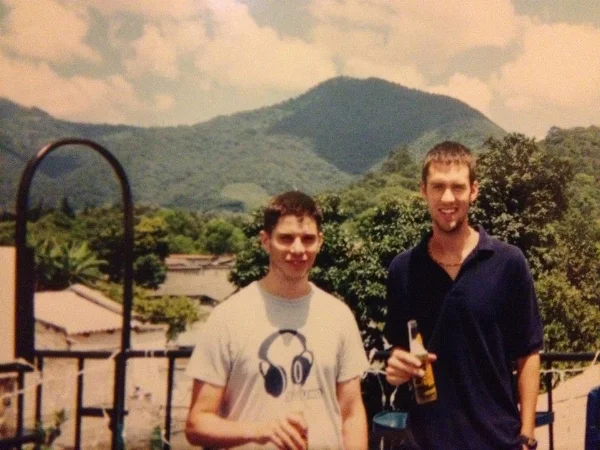 Me (right) and my boy in Antigua Guatemala 2005 with a volcano in the back round! 
