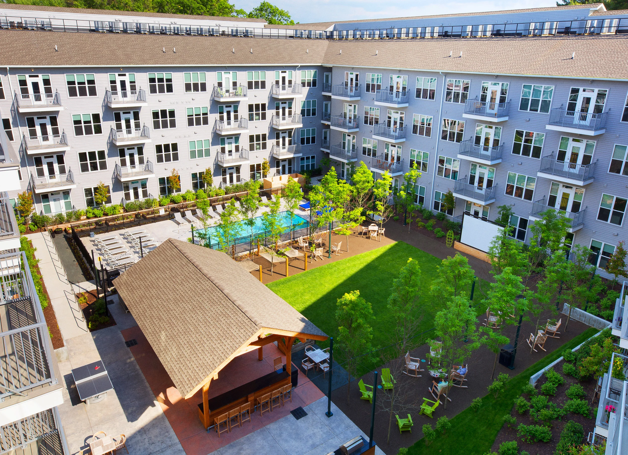 Heirloom-Flats-exterior-aerial-pool-courtyard.jpg
