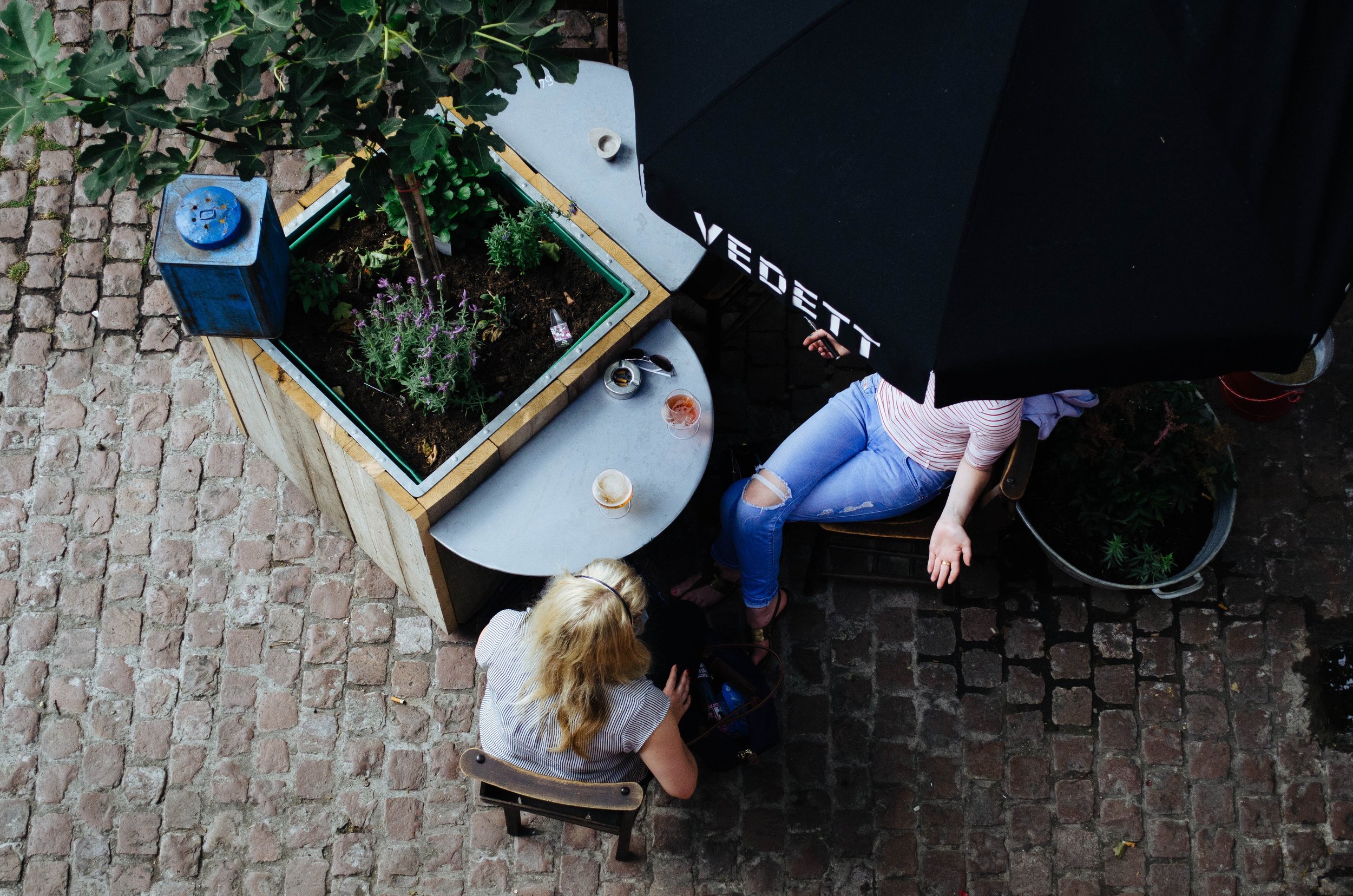 Women drinking coffee outside