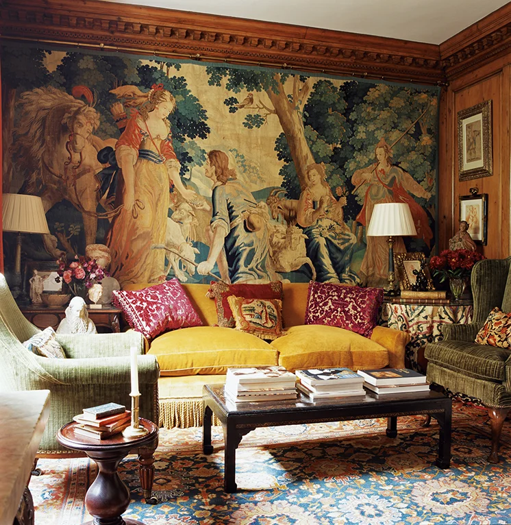 I use textiles and pattern in a rich and harmonious mix that draws you in and ultimately gives a room its comfortable appeal. However if you look closely there are the Alidad plains that create that harmony. I have used a seventeenth century Flemish tapestry, a late nineteenth-century Suzani as a tablecloth, a red cut-velvet nineteenth century Italian cushion with another cushion on the green velvet chair that is made from an eighteenth-century needlework.