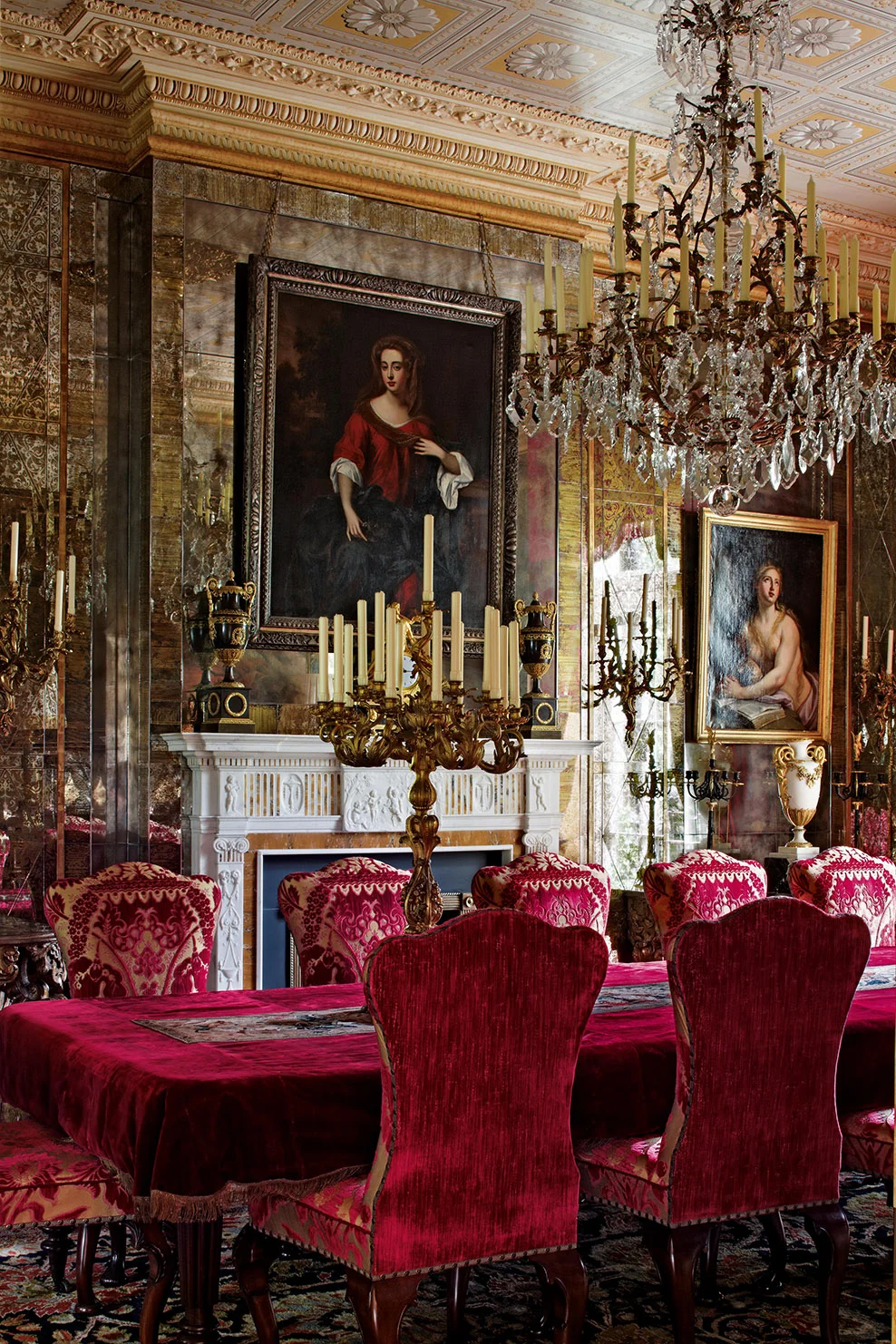 Every millimeter of these London dining room walls have been decorated with a paneled mirror treatment, creating a beautiful effect at night. This room can only be lit by candle, the giant ormolu and crystal chandelier had to have a concealed winch mechanism to raise and lower the piece to light, extinguish and change the one hundred or so beeswax candles.