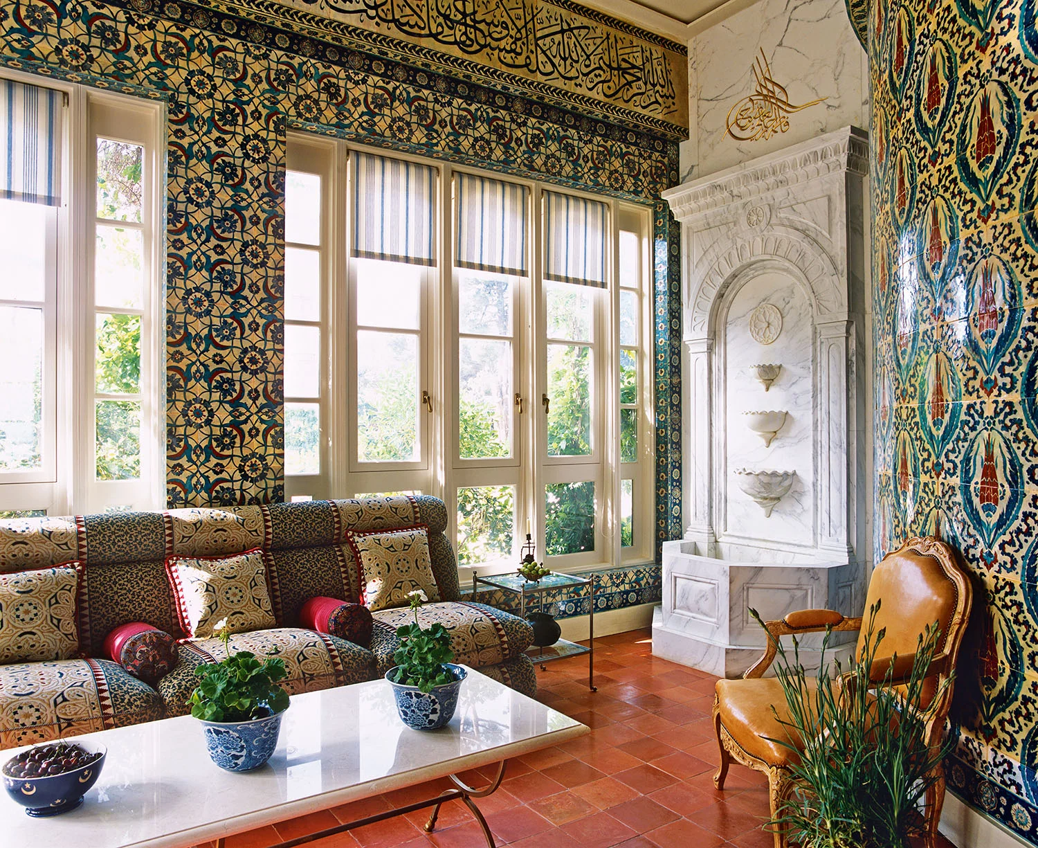This conservatory displays much more than mere decoration - it's a statement of imaginative use of space. The room was once a veranda, but because north-facing, it was never much used. IN this new enclosed incarnation, where the walls are decorated with faux Iznik tiles, the room has become usable throughout the day in all seasons.