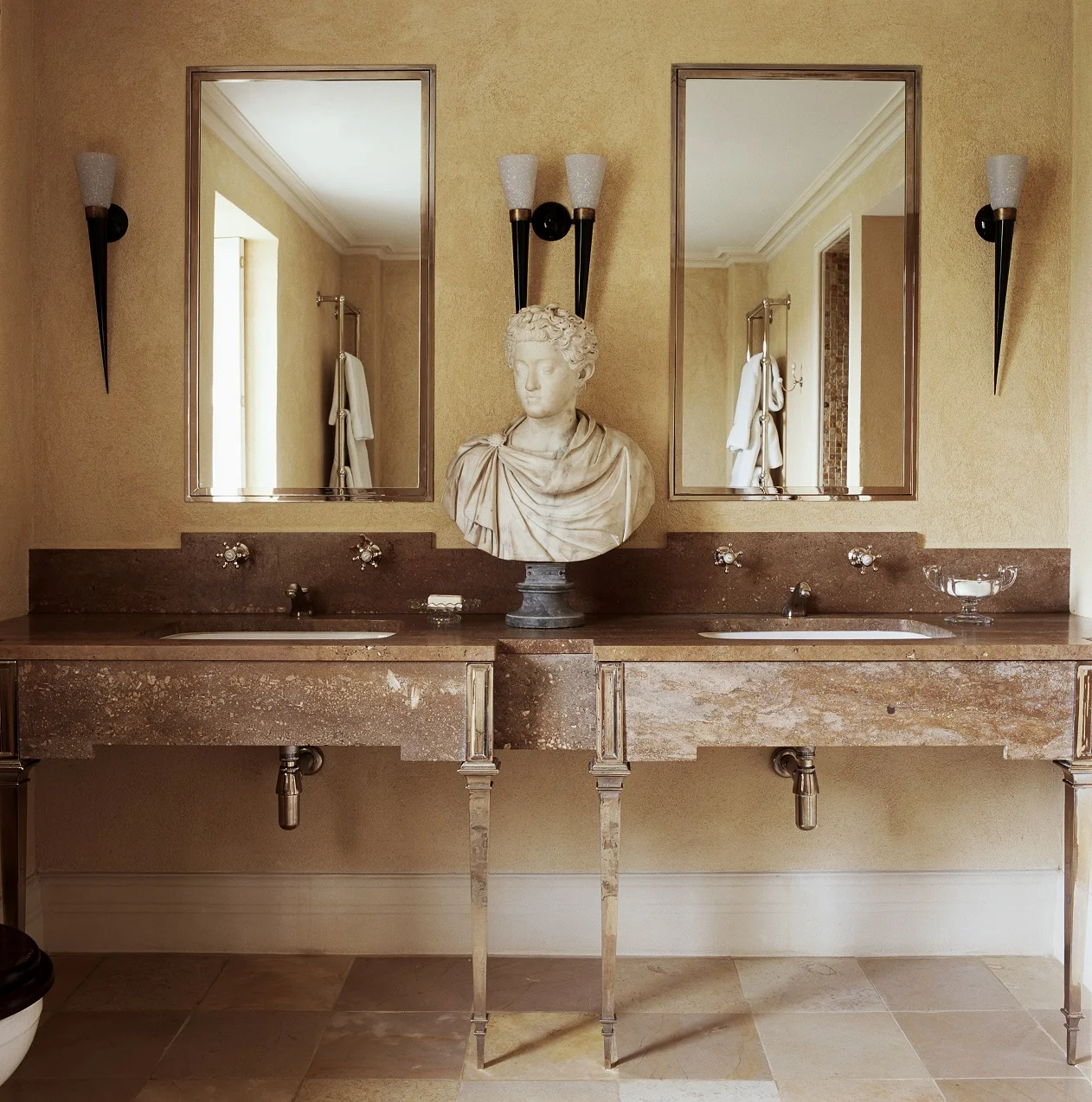 One of my earliest bathrooms from the 1990's, which incorporates mosaic, Jerusalem stone, walnut travertine and polished plaster, has become a sort of benchmark for this kind of Roman-inspired bathing space that has since proven to be very popular. 