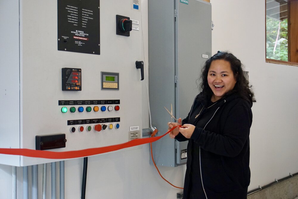  As the newest member of our community, postulant Mariel cut the ribbon to “open” the control panel. 