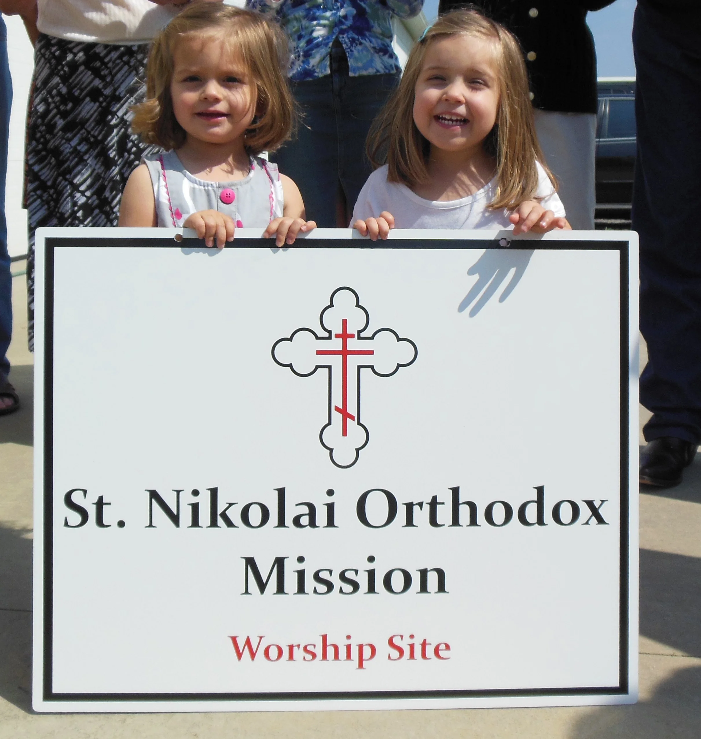 Sign with kids.jpg