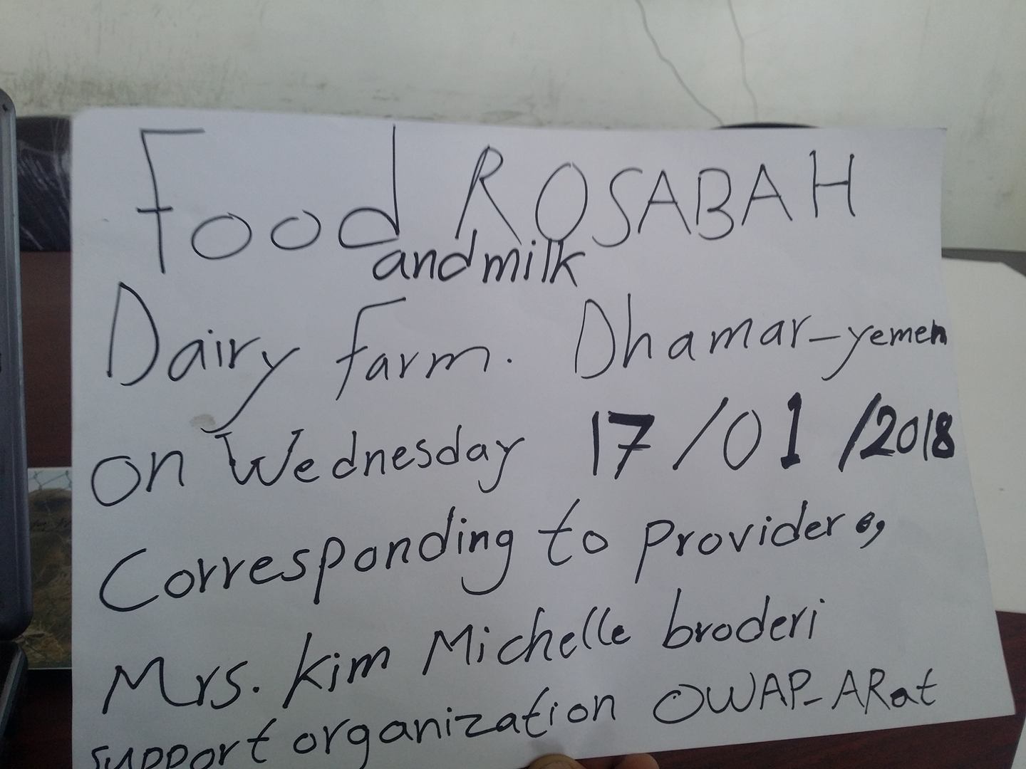 Dhamar rosabah farm cow rescue 17 Jan 2018 with Fateh sign bran hay milk.jpg