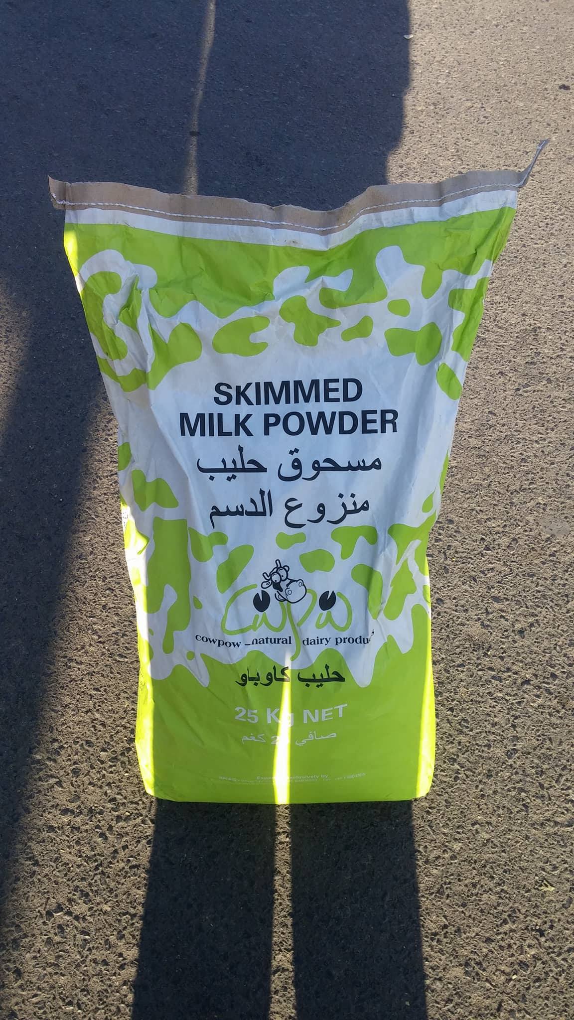 Dhamar milk Muaad delivering this morning.jpg