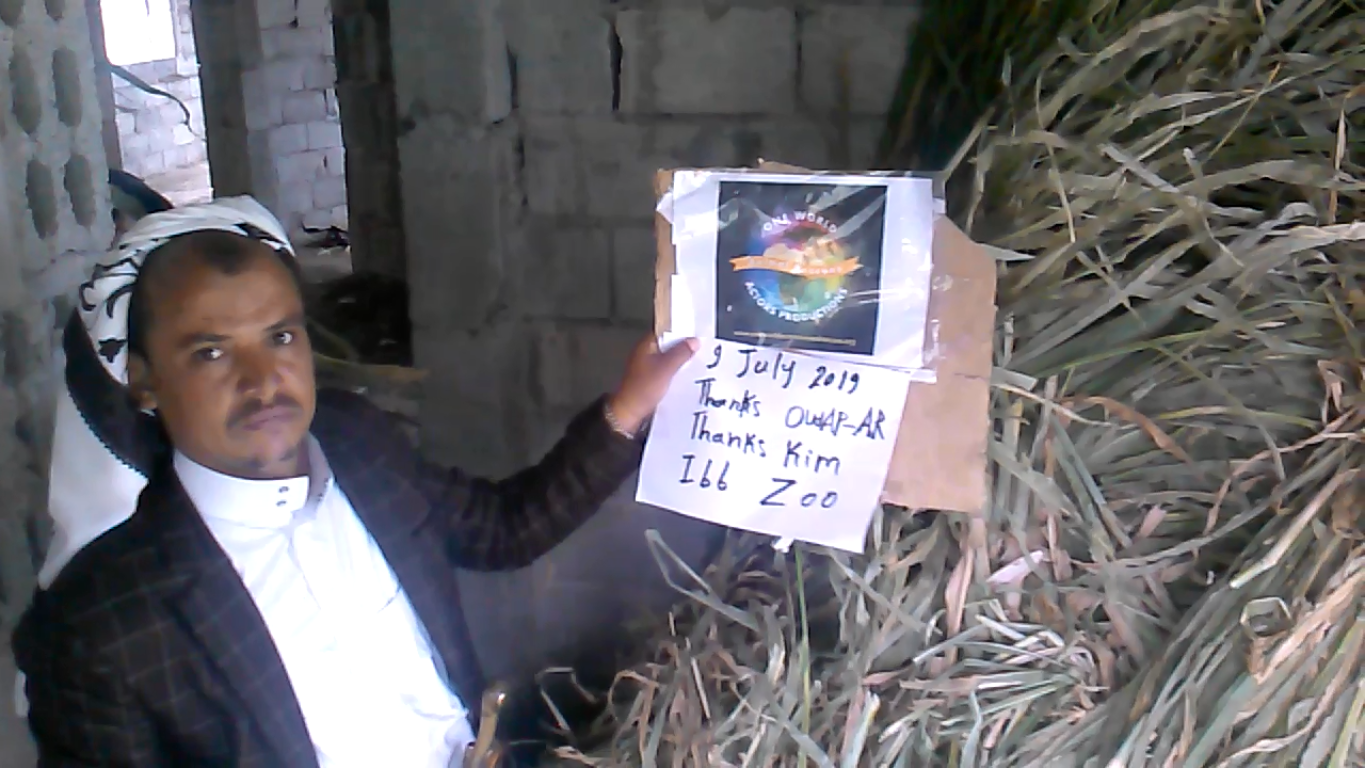 ibb zoo man with OWAP AR sign feed herbivores 9 JULY 2019.png