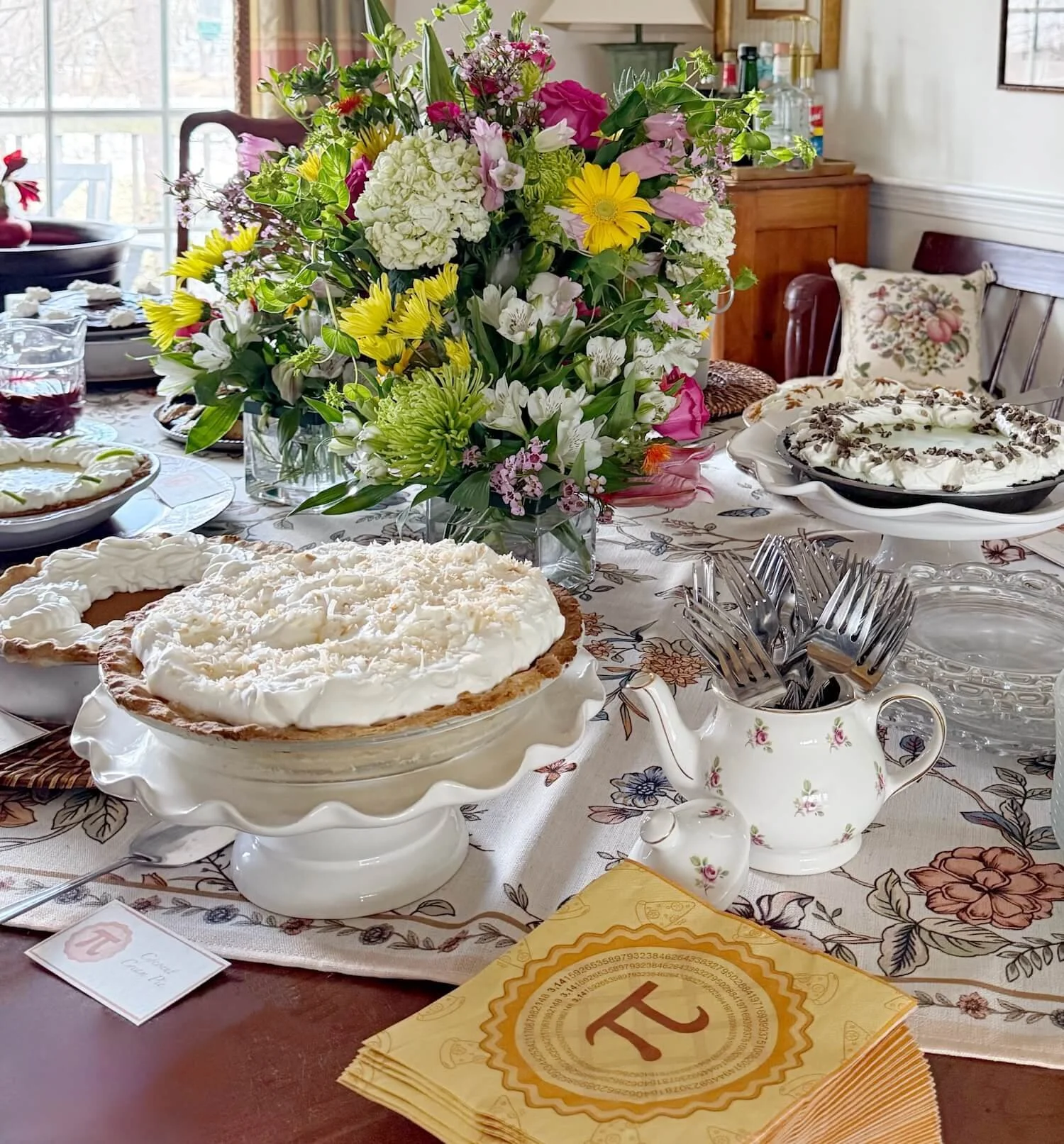 pi party table with napkins and plates