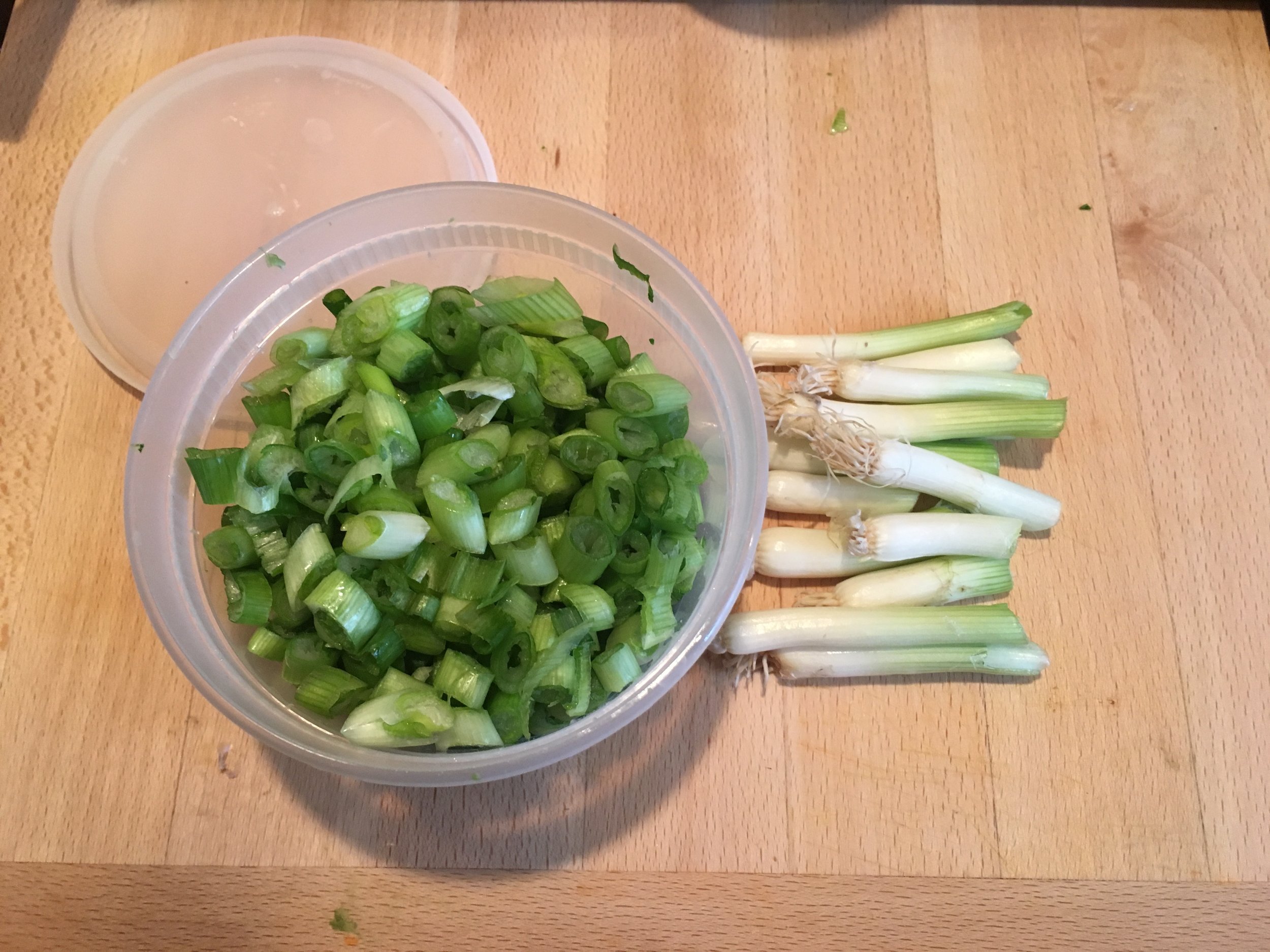You can even regrow your green onion by putting the white part in a glass with water!